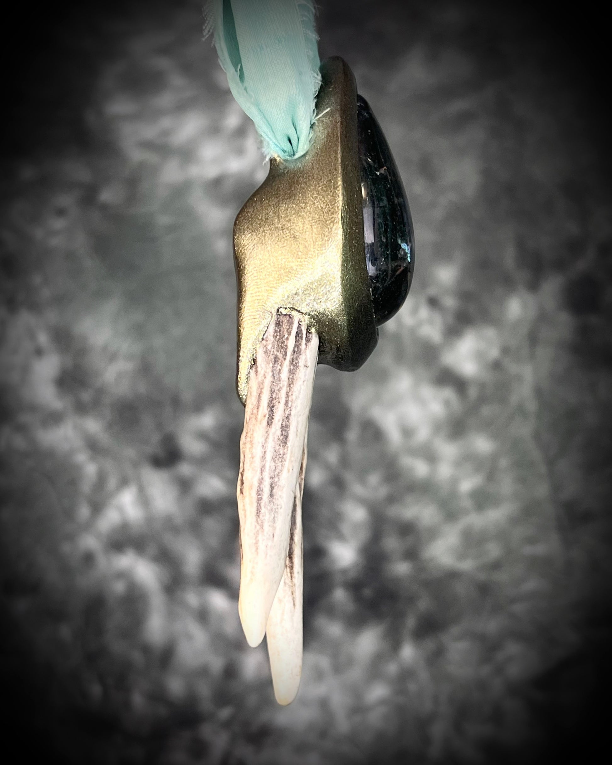 Artemis Goddess handmade Necklace with green crystal quartz teardrop framed in a gold setting and two naturally shed deer antlers, hung from mint green recycled silk. Nature inspired jewelry gift for her. 