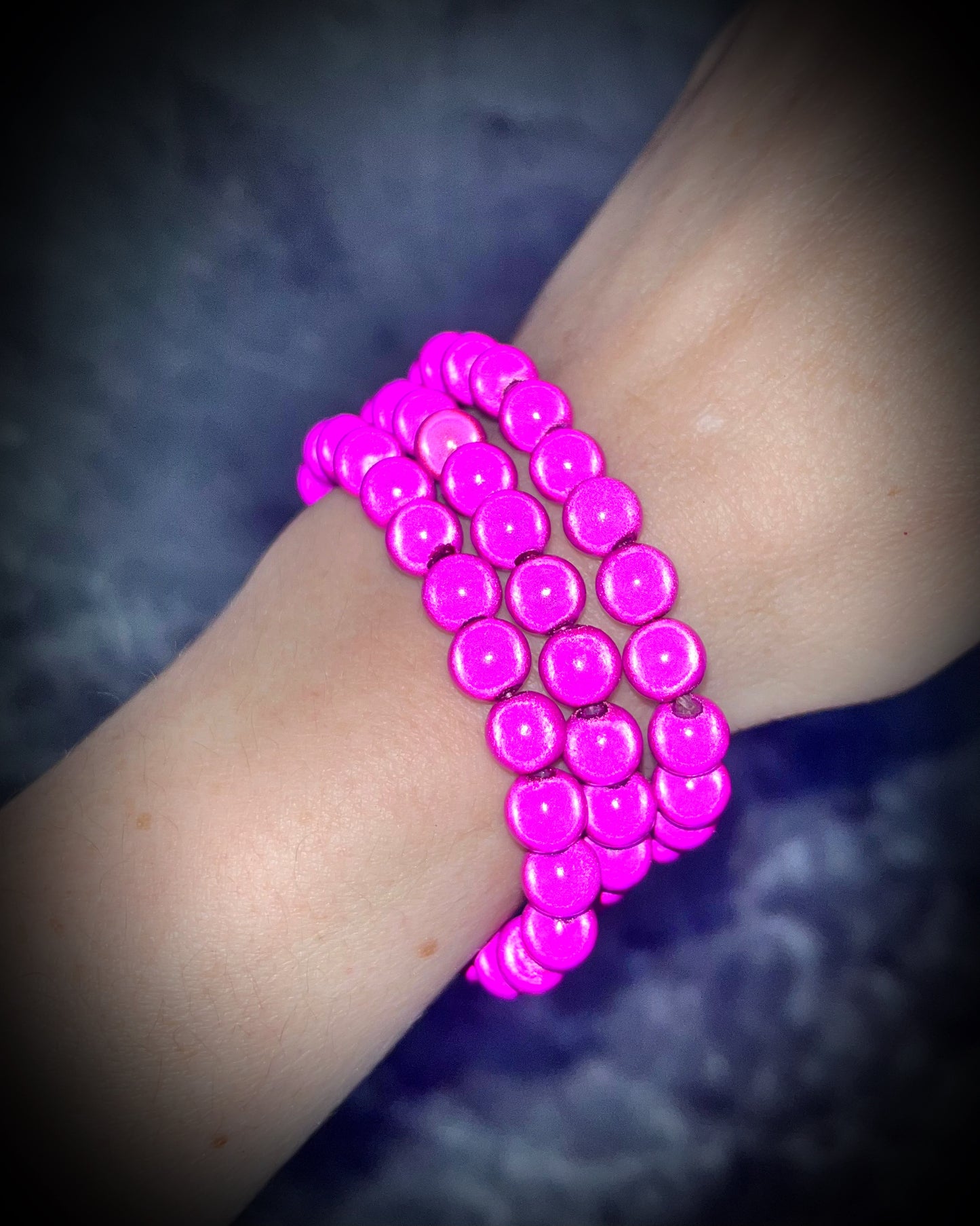 Colorful Eclipse bracelets from Become Spellbound!  Magical illusion bracelets for stacking, parties, summer jewelry, festivals, raves, travel jewelry and more! Gift for her, magenta pink beaded bracelet. 