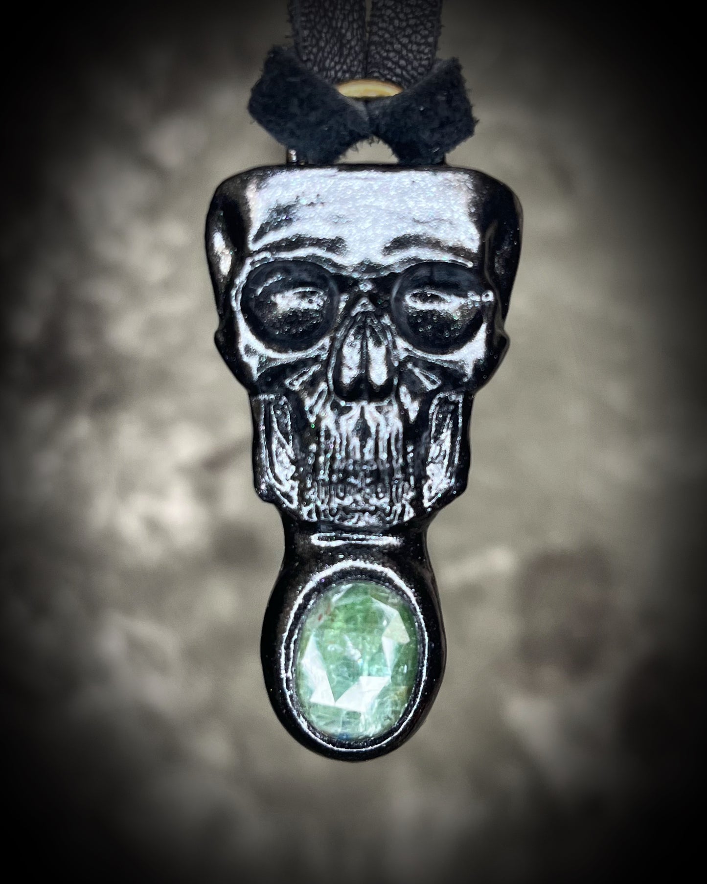 Black skull and green kyanite crystal necklace on black leather.  Macabre gothic jewelry for her, halloween gemstone jewelry for fall 2025 gift for him.