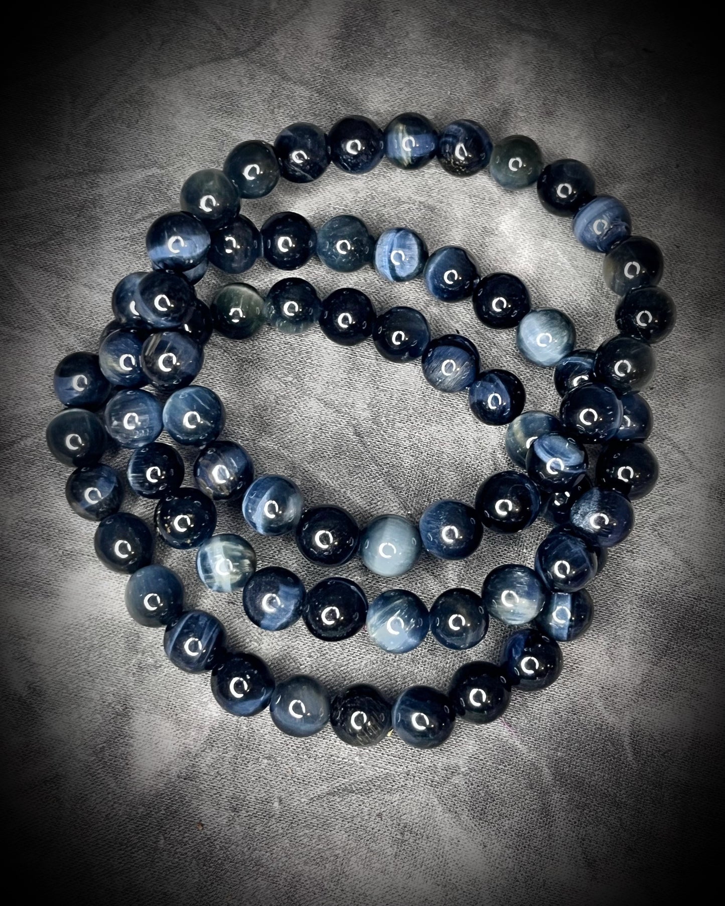 Blue  tigers eye natural crystal healing beaded bracelets for protection, grounding, emf shielding and gemstone magic!  Crystal stacking bracelets for holiday gifting and new year resolution setting.