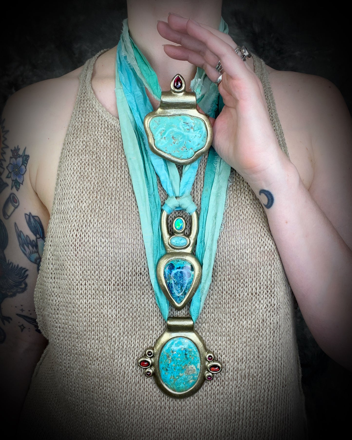 Turquoise and Garnet Regal chunky gold Necklace Crystal Healing Pendant gift for her. Handmade in the USA and hung from recycled silk for an eco-friendly elegance.
