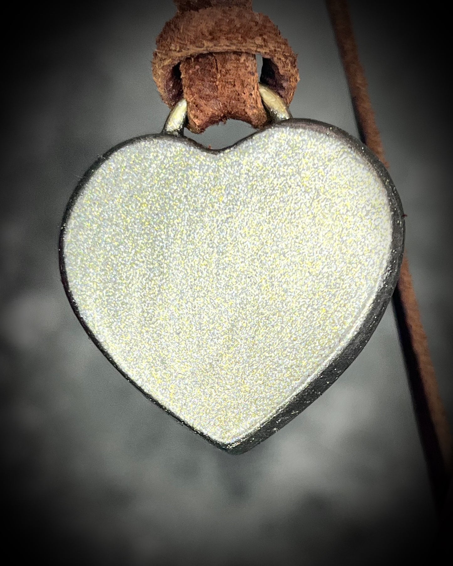 Back of Celestial blue lapis lazuli necklace displayed on natural fabric, handmade bohemian crystal jewelry.