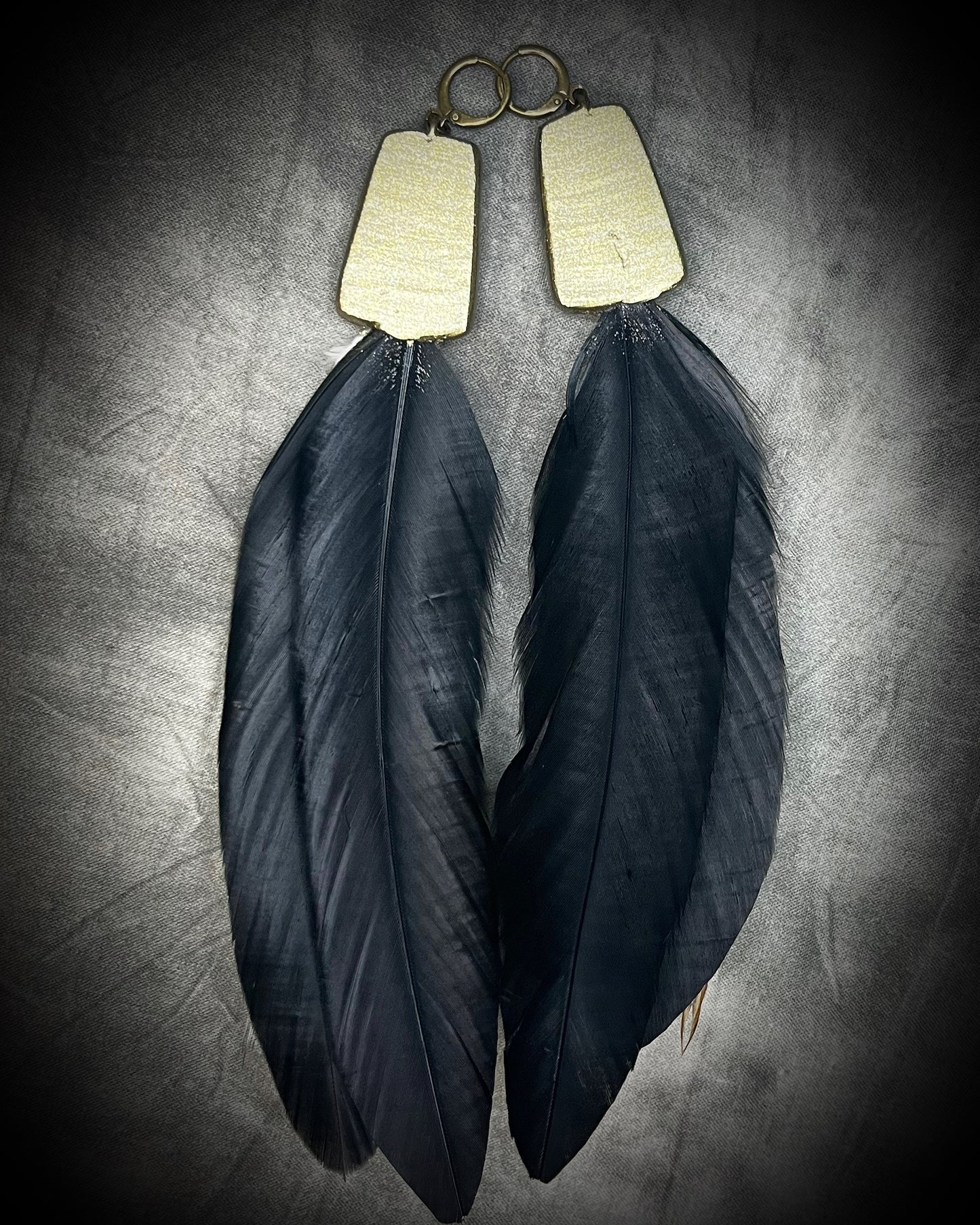 Chrysocolla and feather earrings with blue-green natural stone, gold finish, and hypoallergenic brass huggie hooks, handmade by Become Spellbound.