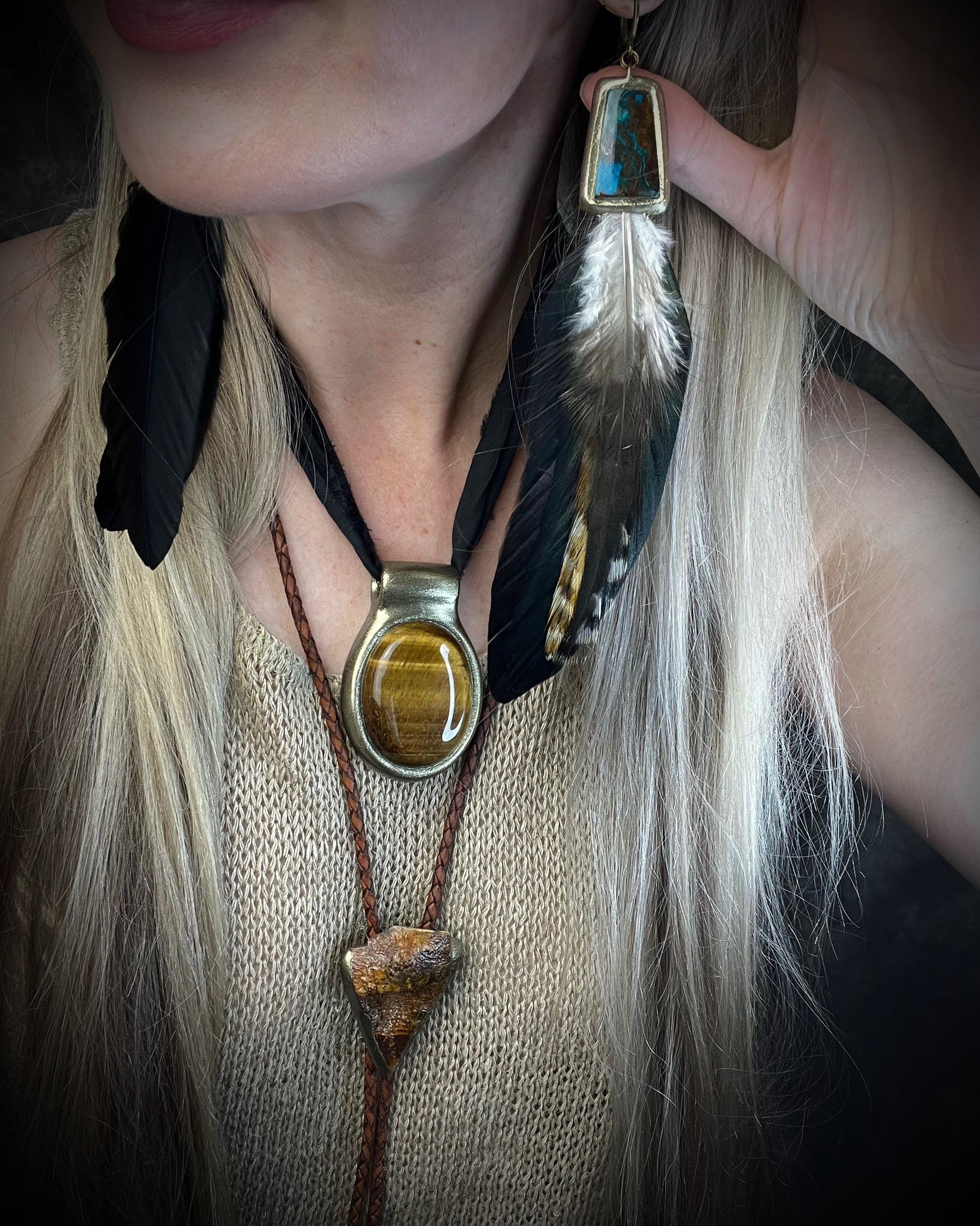 Chrysocolla and feather earrings with blue-green natural stone, gold finish, and hypoallergenic brass huggie hooks, handmade by Become Spellbound.
