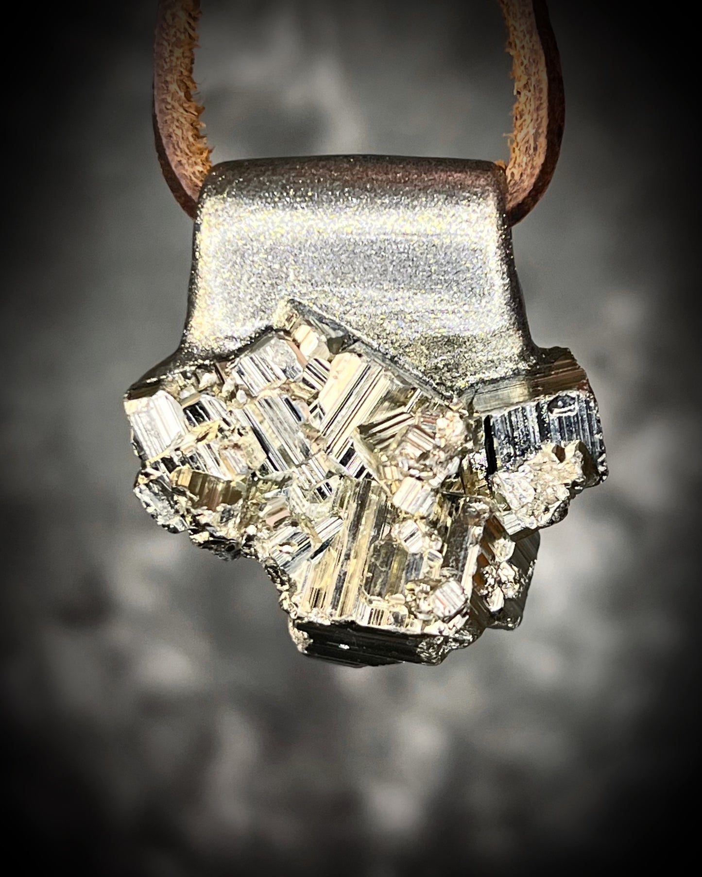 Chunky Pyrite crystal necklace handmade and hung from brown leather. Sculpttural raw gemstone jewelry for her.  