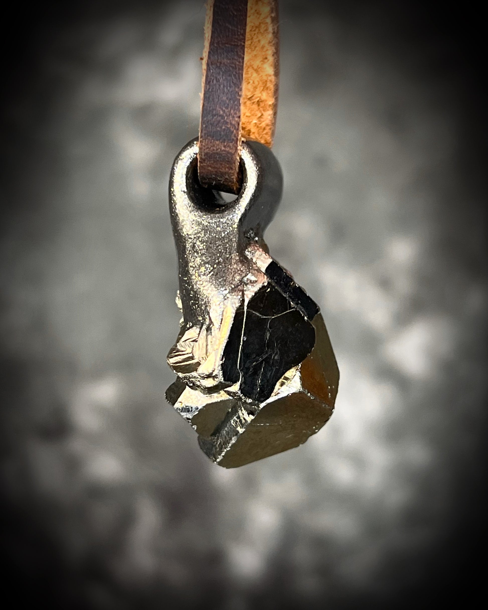 Chunky Pyrite crystal necklace handmade and hung from brown leather. Sculpttural raw gemstone jewelry for her. Manifestation pendant, wearable magic. 