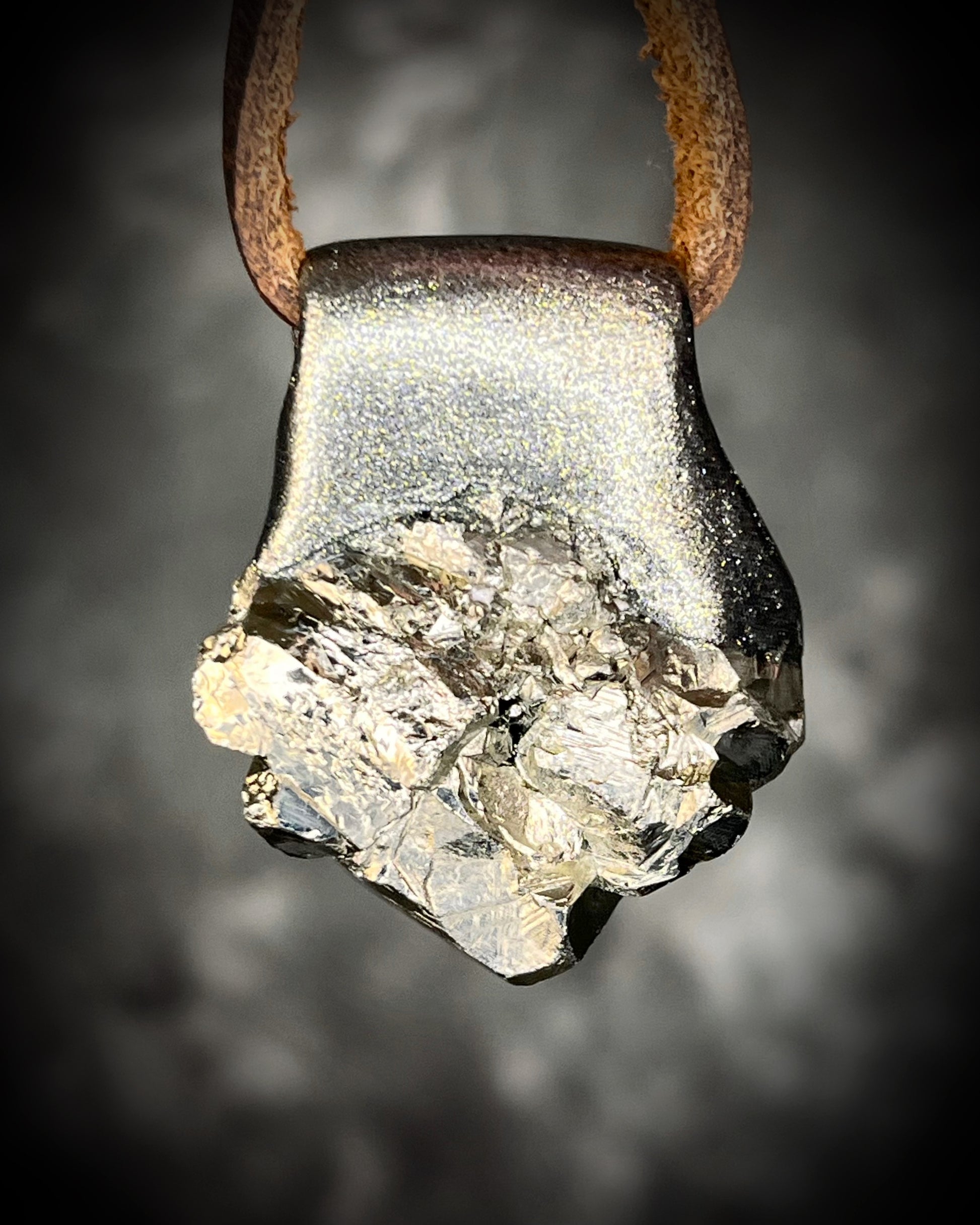Chunky Pyrite crystal necklace handmade and hung from brown leather. Sculpttural raw gemstone jewelry for her. Manifestation pendant, wearable magic. 