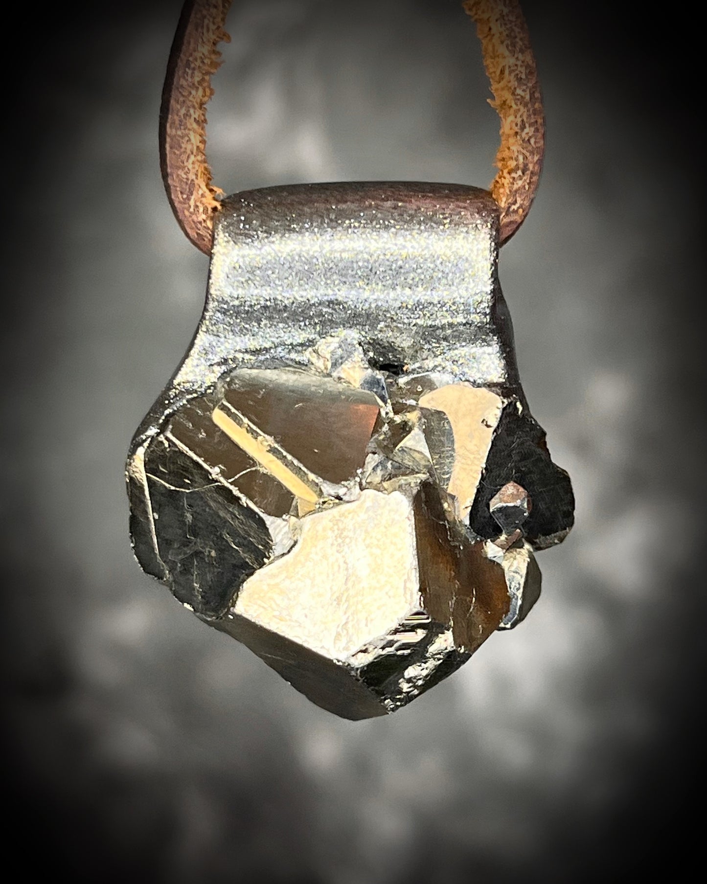 Chunky Sparkling Pyrite crystal necklace handmade and hung from brown leather. Sculpttural raw gemstone jewelry for her. Manifestation pendant, wearable magic. 