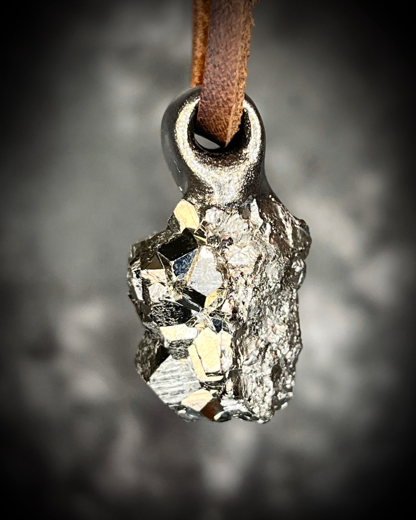 Chunky Sparkling Pyrite crystal necklace handmade and hung from brown leather. Sculpttural raw gemstone jewelry for her. Manifestation pendant, wearable magic. 