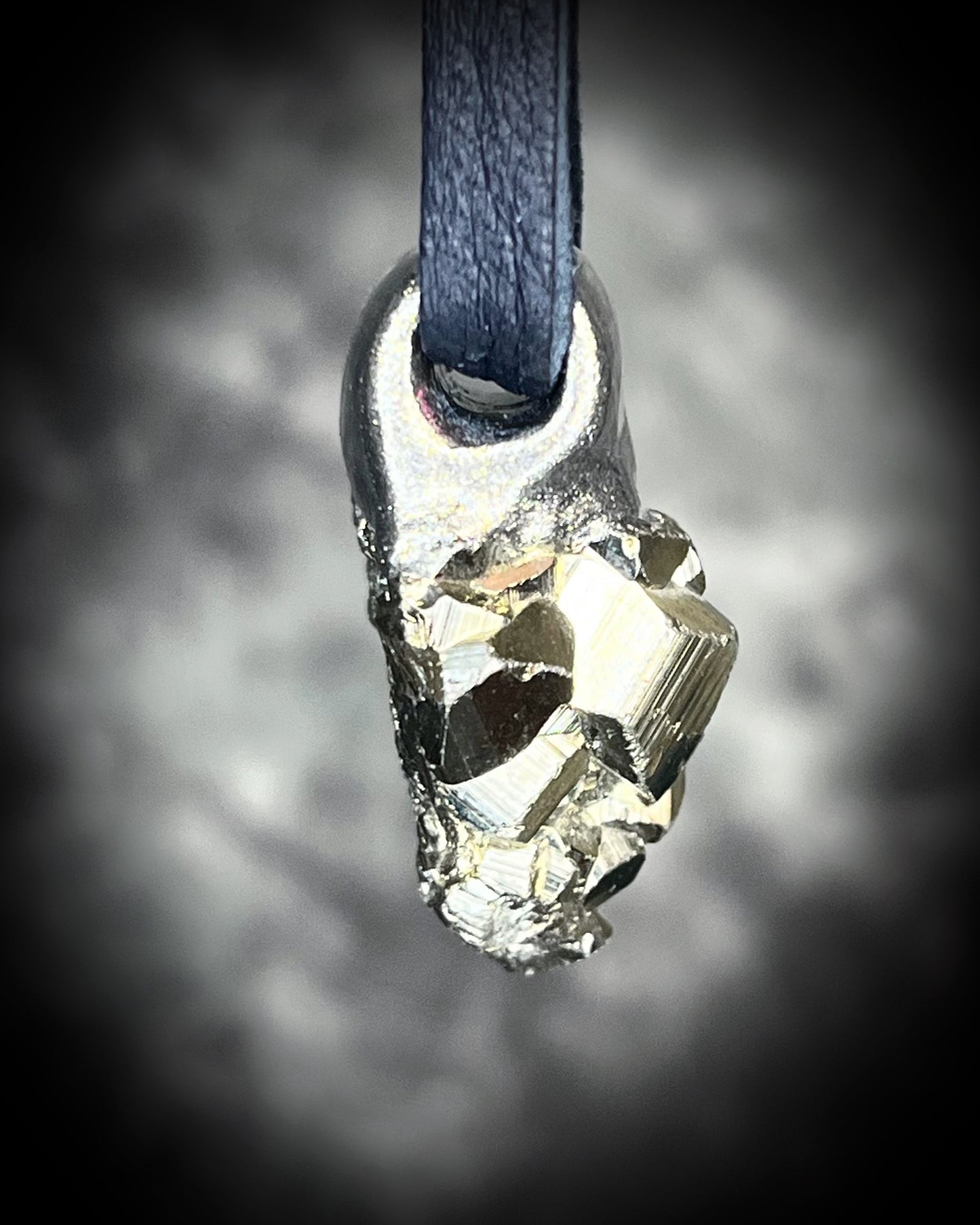 Chunky pyrite pendant necklace on black leather cord, raw crystal talisman jewelry, bold statement necklace with metallic gold healing stone.