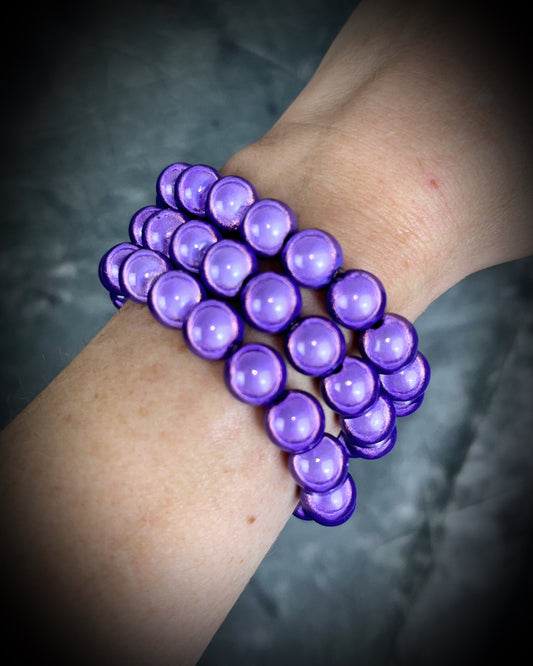 Colorful Eclipse bracelets from Become Spellbound!  Magical illusion bracelets for stacking, parties, summer jewelry, festivals, raves, travel jewelry and more! Gift for her, magenta pink beaded bracelet. 