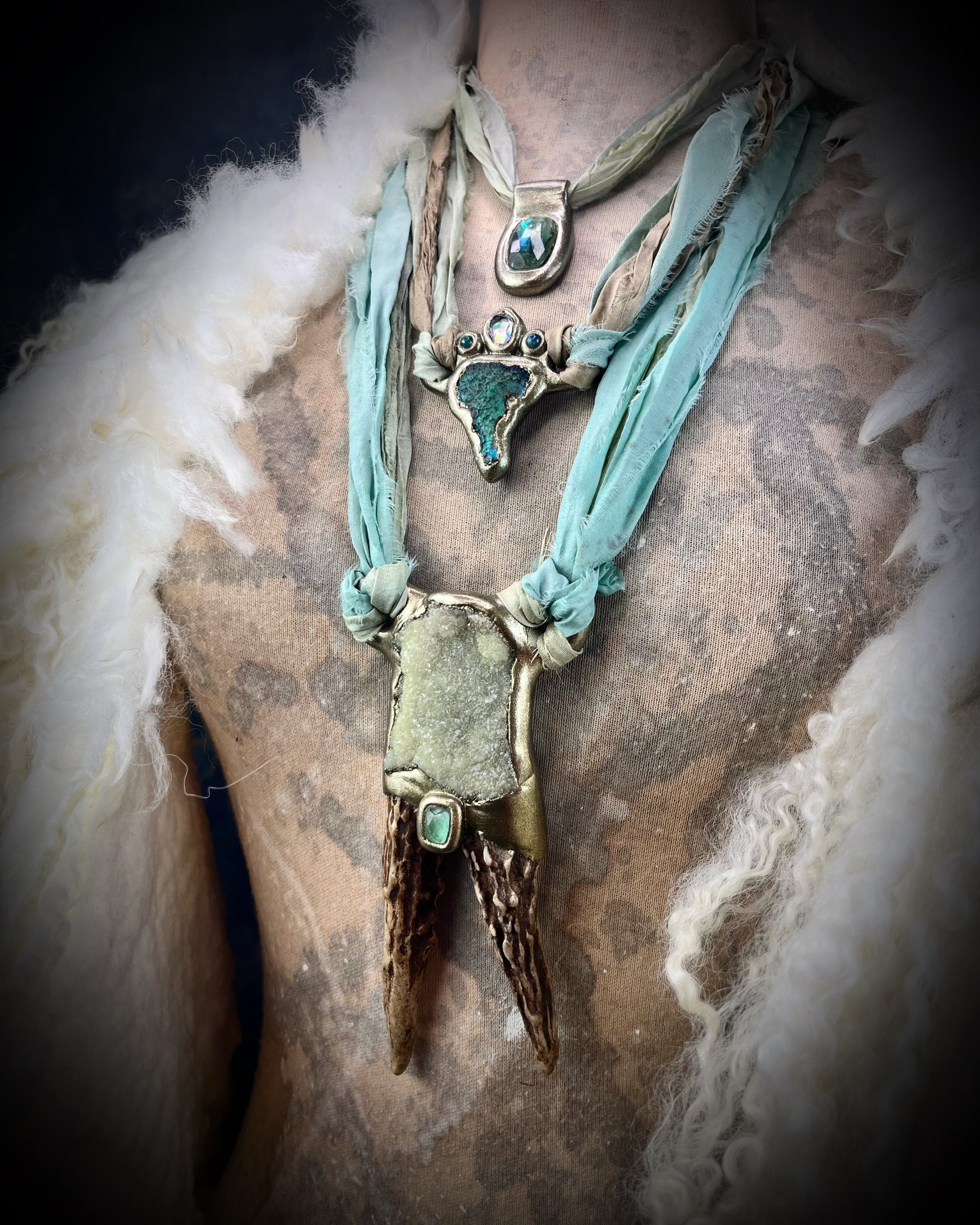 Cosplay, fantasy movie set inspired, game of thrones handmade antler and prehnite crystal talisman hung from recycled silk.  Be the Queen of Dragons with this bold and powerful necklace.  