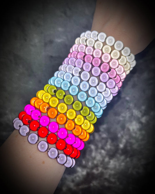 Colorful Eclipse bracelets from Become Spellbound!  Magical illusion bracelets for stacking, parties, summer jewelry, festivals, raves, travel jewelry and more!  