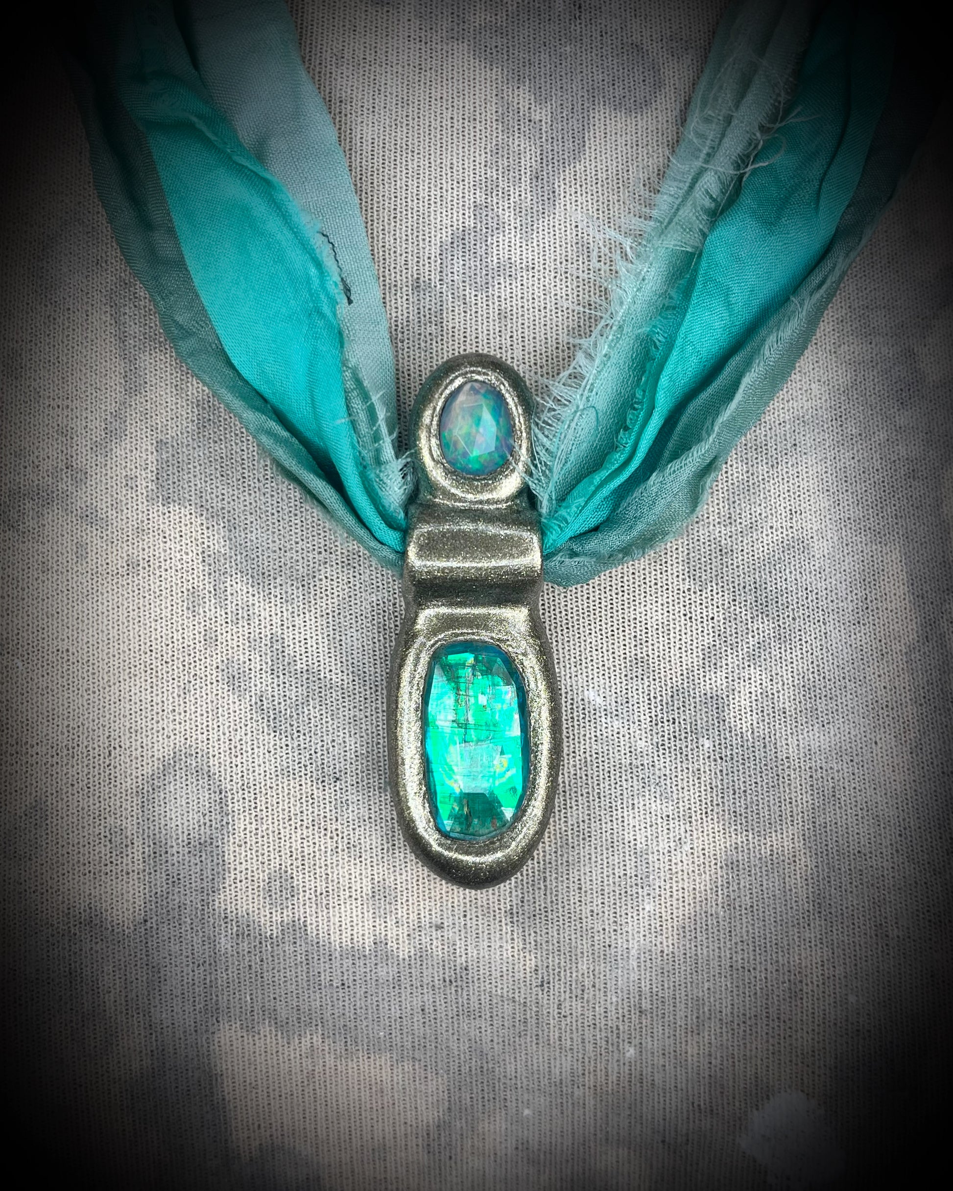 Green kyanite and opal gemstone faceted crystal healing heart chakra pendant on recycled silk.  Best travel jewelry for summer, festival or wedding