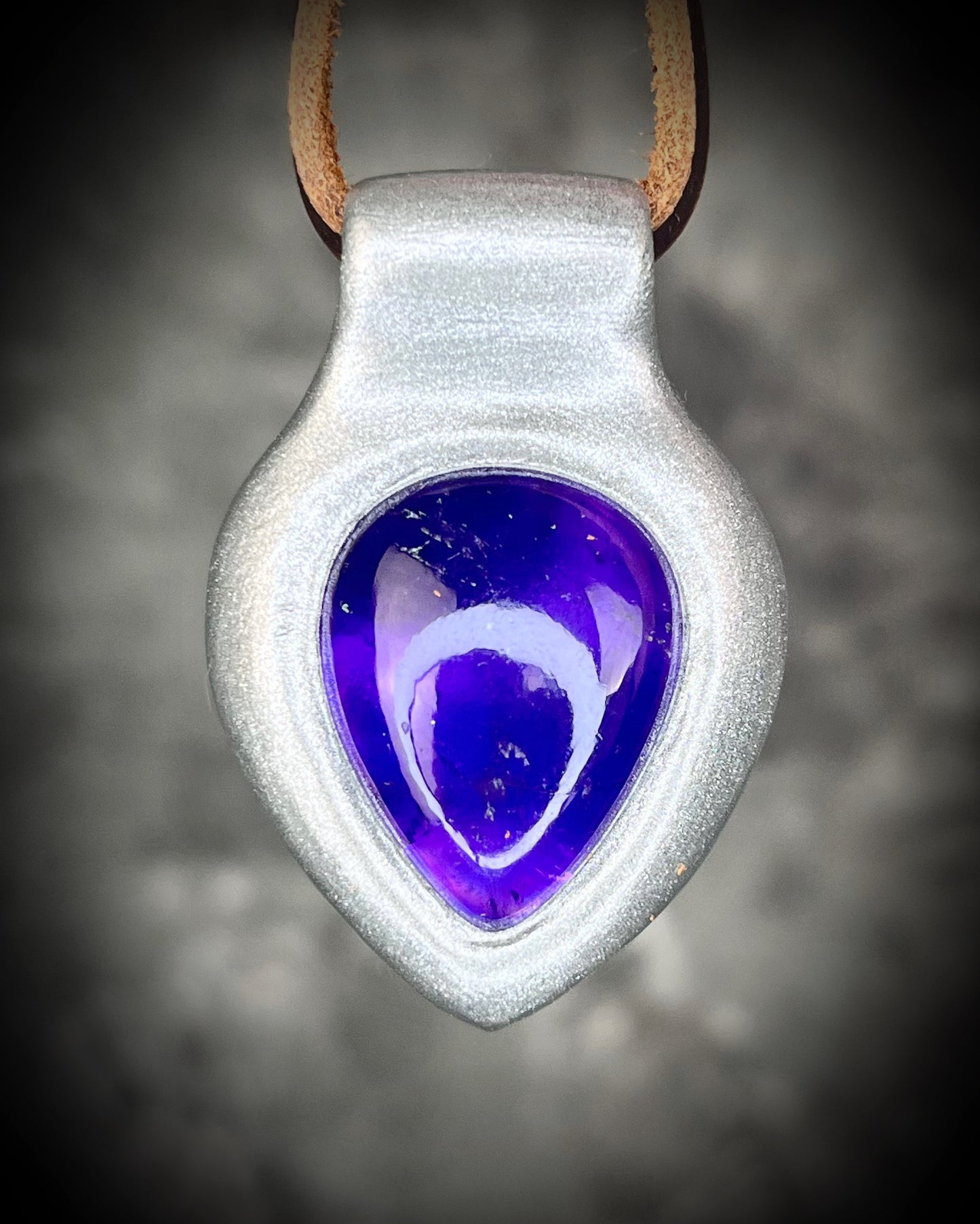 Enchanting amethyst crystal teardrop silver pendant hung from soft organic brown leather. Mystical and spiritual handmade gift jewelry for her. Birthstone jewelry for her. Aquarius gift necklace. 
