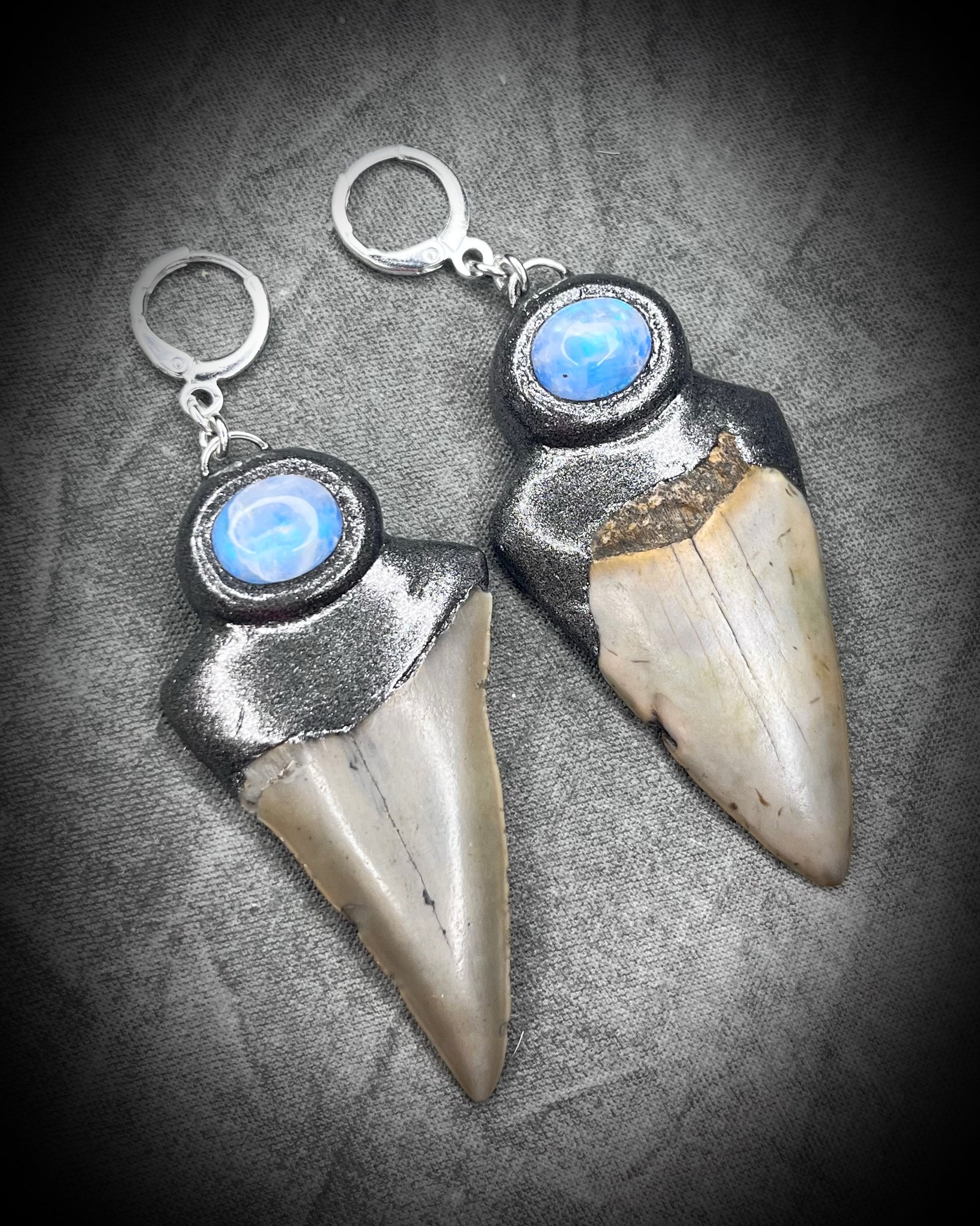 Natural shark tooth fossil and moonstone gunmetal dark silver with sterling silver mixed metal earrings.  Handmade in the USA, these dangle earrings will empower and inspire you!  Best natural history gift for her. 