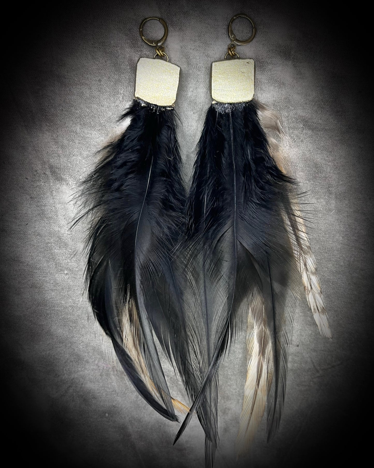 Emerald crystal heart chakra healing boho feather earrings.  Handmade gemstone and feather dangle earrings with ethically sourced elements for festival goddesses!