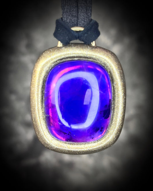Enchanting amethyst crystal pendant in a gold finish hung from soft organic black leather. Mystical and spiritual handmade gift jewelry for her. 