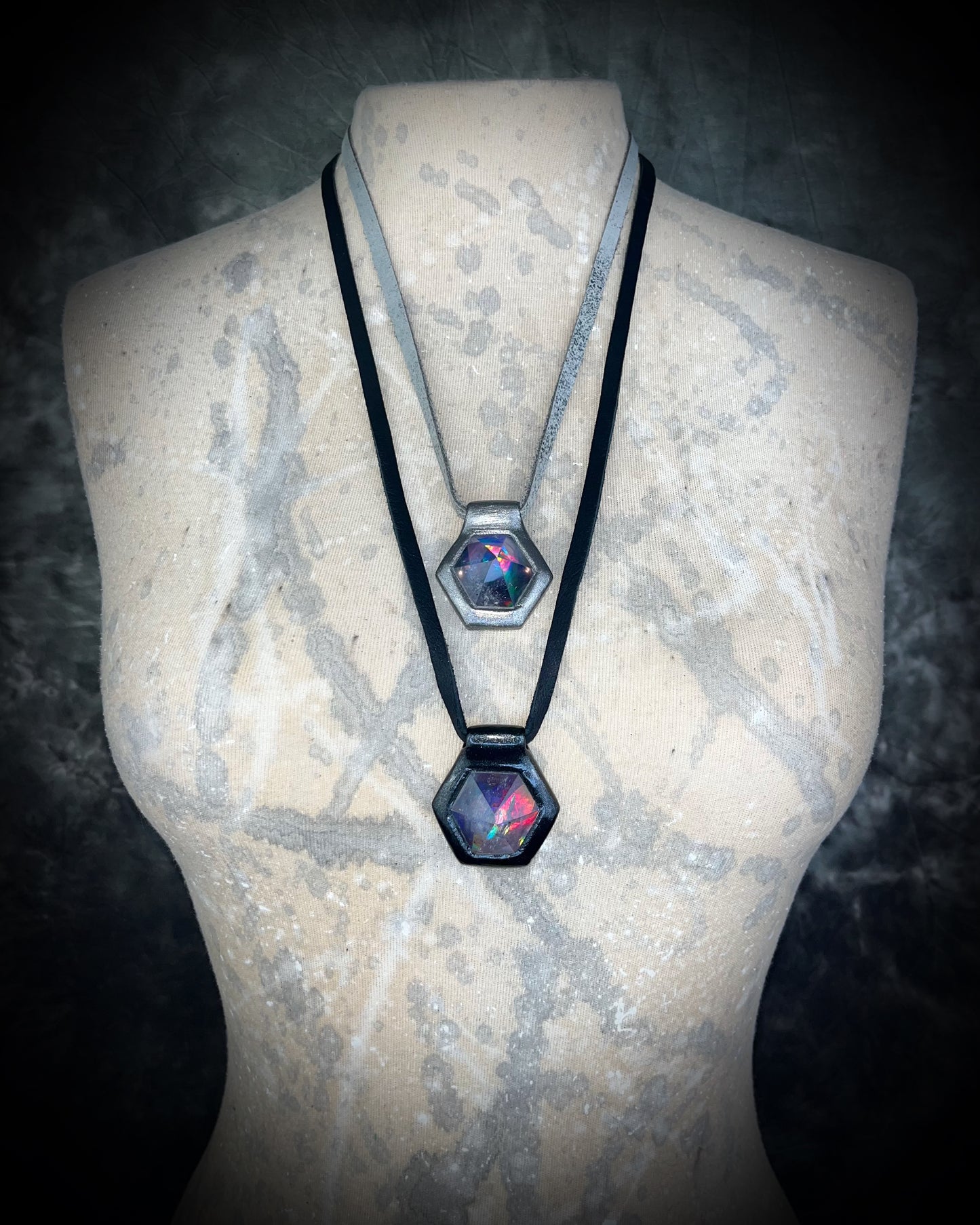 Stacked silver and Black David Bowie inspired designer quartz black rainbow necklaces. On silver and black leather adjustable & customizable from choker to pendant. 