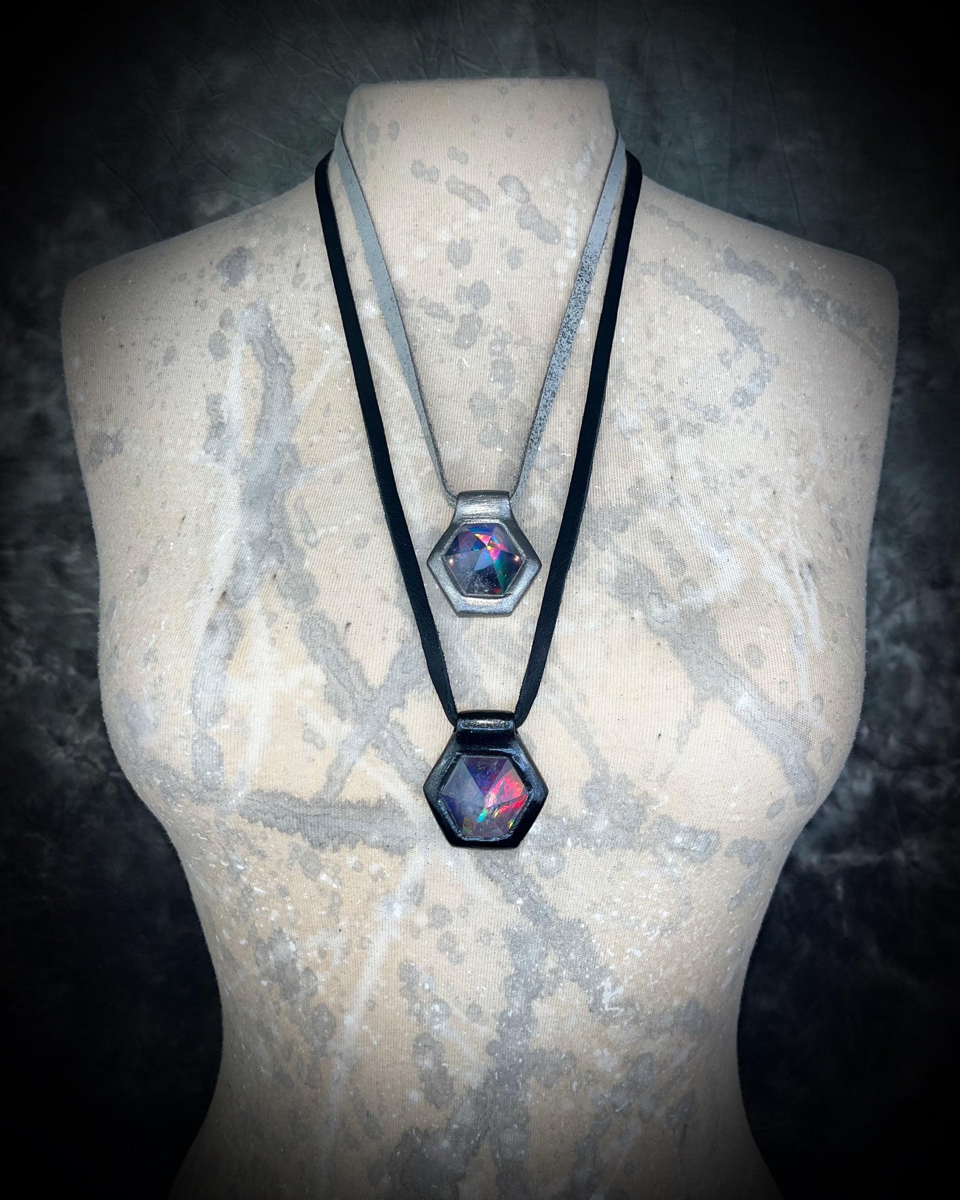 Stacked silver and Black David Bowie inspired designer quartz black rainbow necklaces. On silver and black leather adjustable & customizable from choker to pendant. 