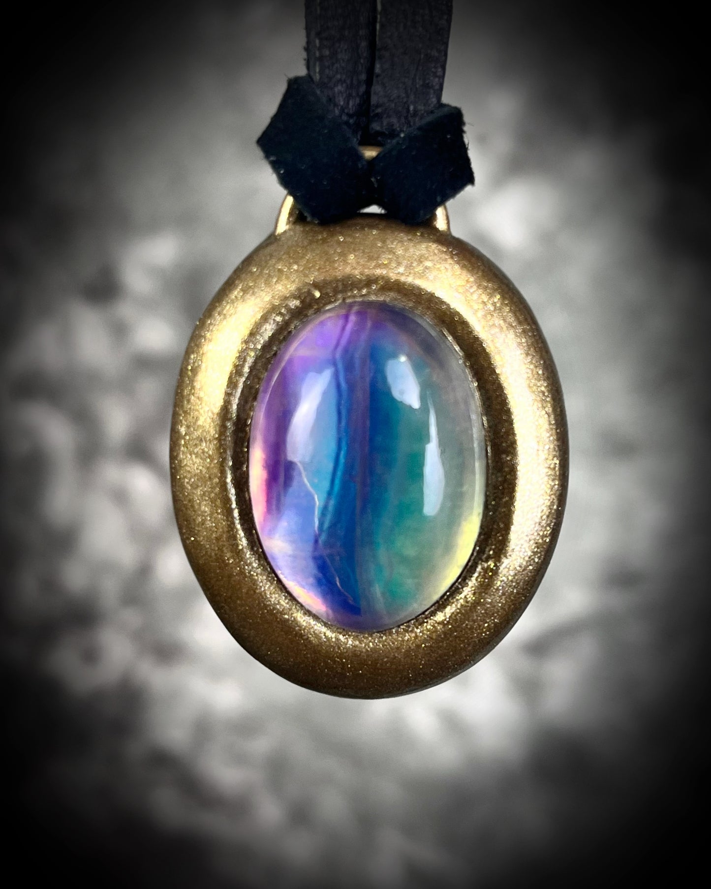 Fluorite cabochon oval necklaces in gold tone settings on black leather – mystical crystal jewelry for clarity, focus, and balance. Handmade gemstone pendant talismans, grounding and protective fluorite statement necklaces, perfect spiritual jewelry for daily wear, meditation, or gifting.