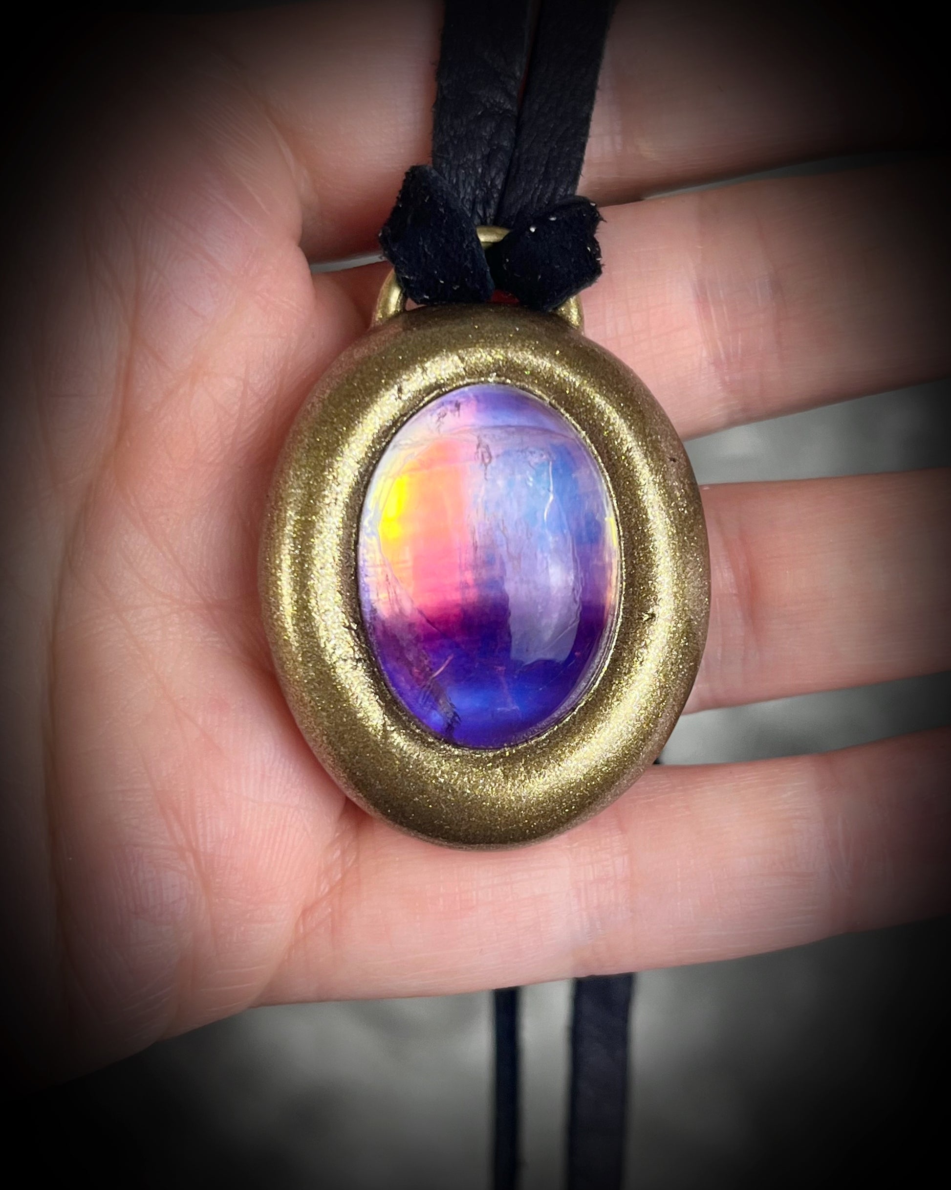 Fluorite cabochon oval necklaces in gold tone settings on black leather – mystical crystal jewelry for clarity, focus, and balance. Handmade gemstone pendant talismans, grounding and protective fluorite statement necklaces, perfect spiritual jewelry for daily wear, meditation, or gifting.