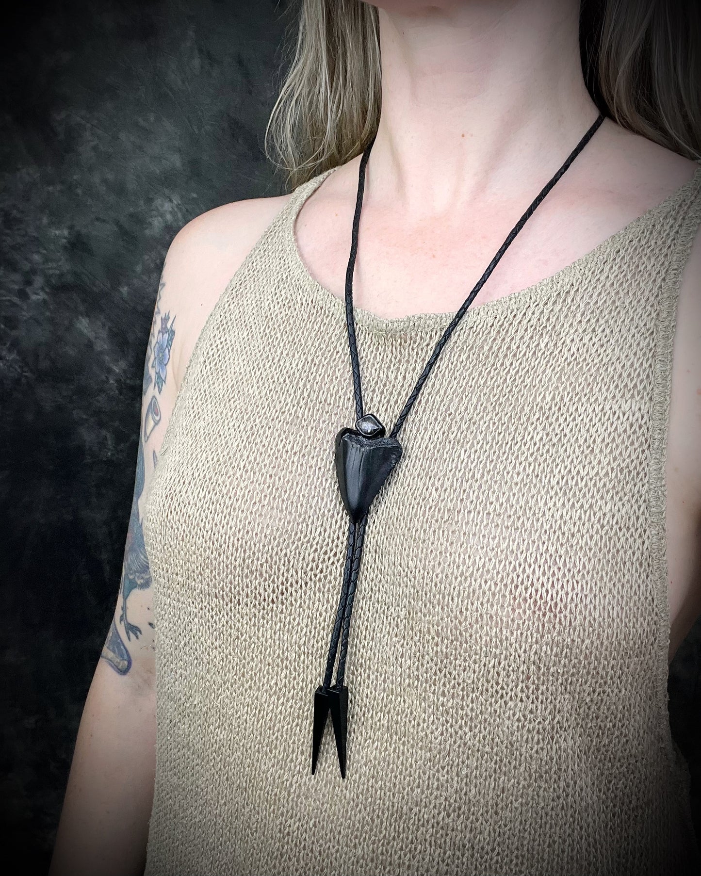 Fossil Great White shark tooth bolo tie with petroleum quartz crystal, black leather, and black spike tips, gothic statement fossil jewelry handmade in Baltimore Maryland