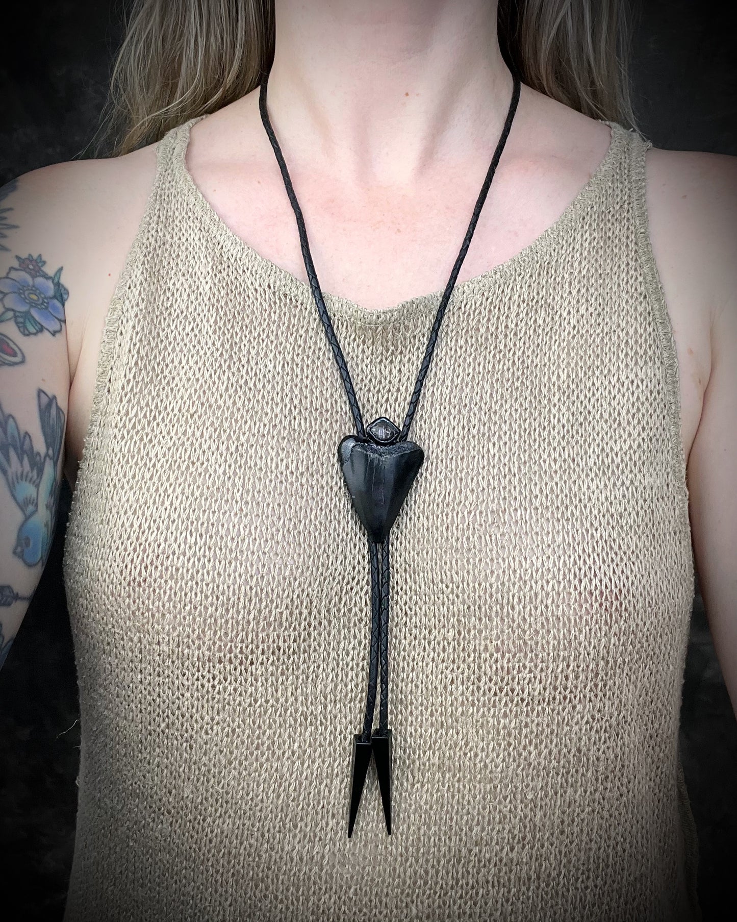 Fossil Great White shark tooth bolo tie with petroleum quartz crystal, black leather, and black spike tips, gothic statement fossil jewelry handmade in Baltimore Maryland