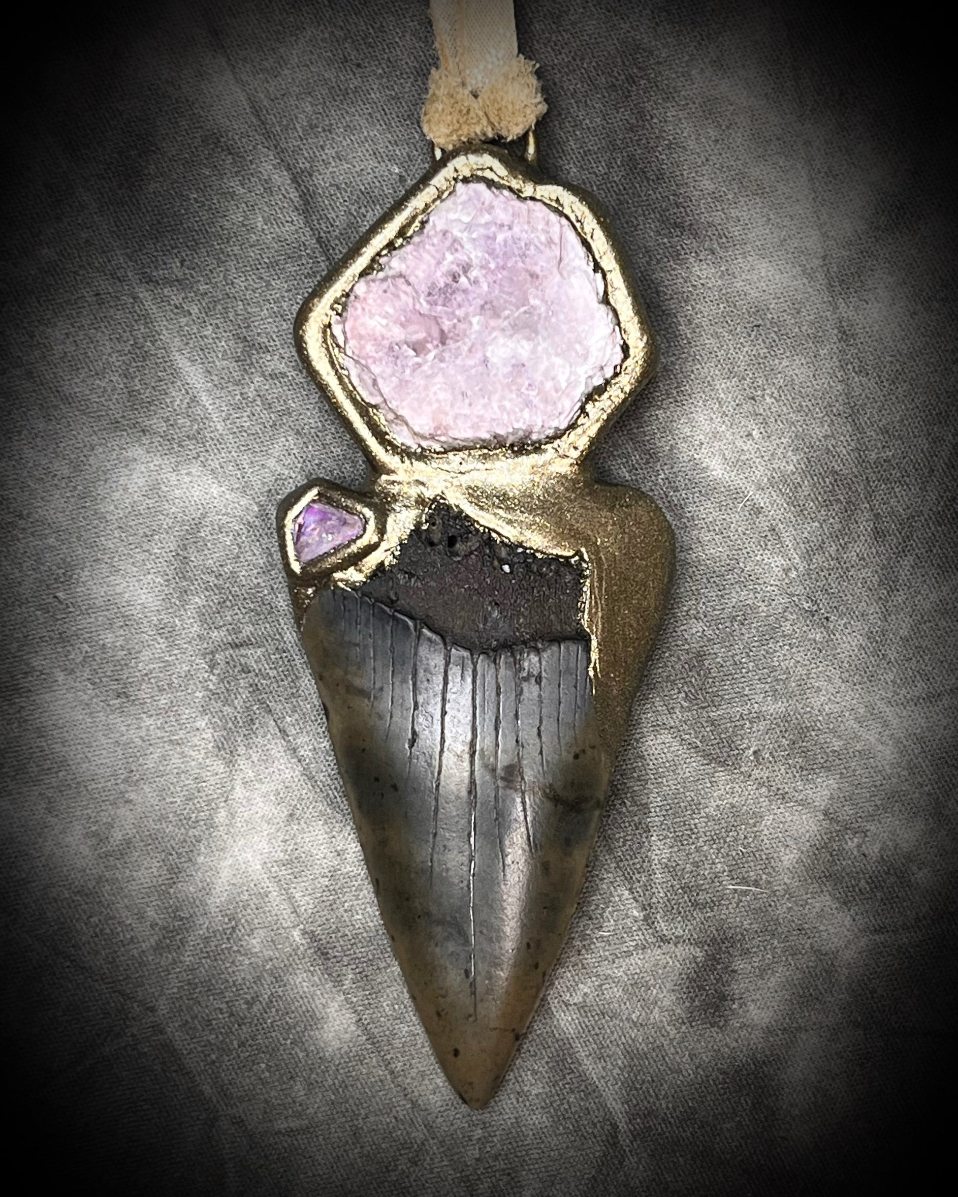Fossil Mako Shark Tooth necklace hung from soft gold leather and adorned with soothing Lepidolite crystal and lavender spinel gemstone. Spiritual boho jewelry gift for her. 