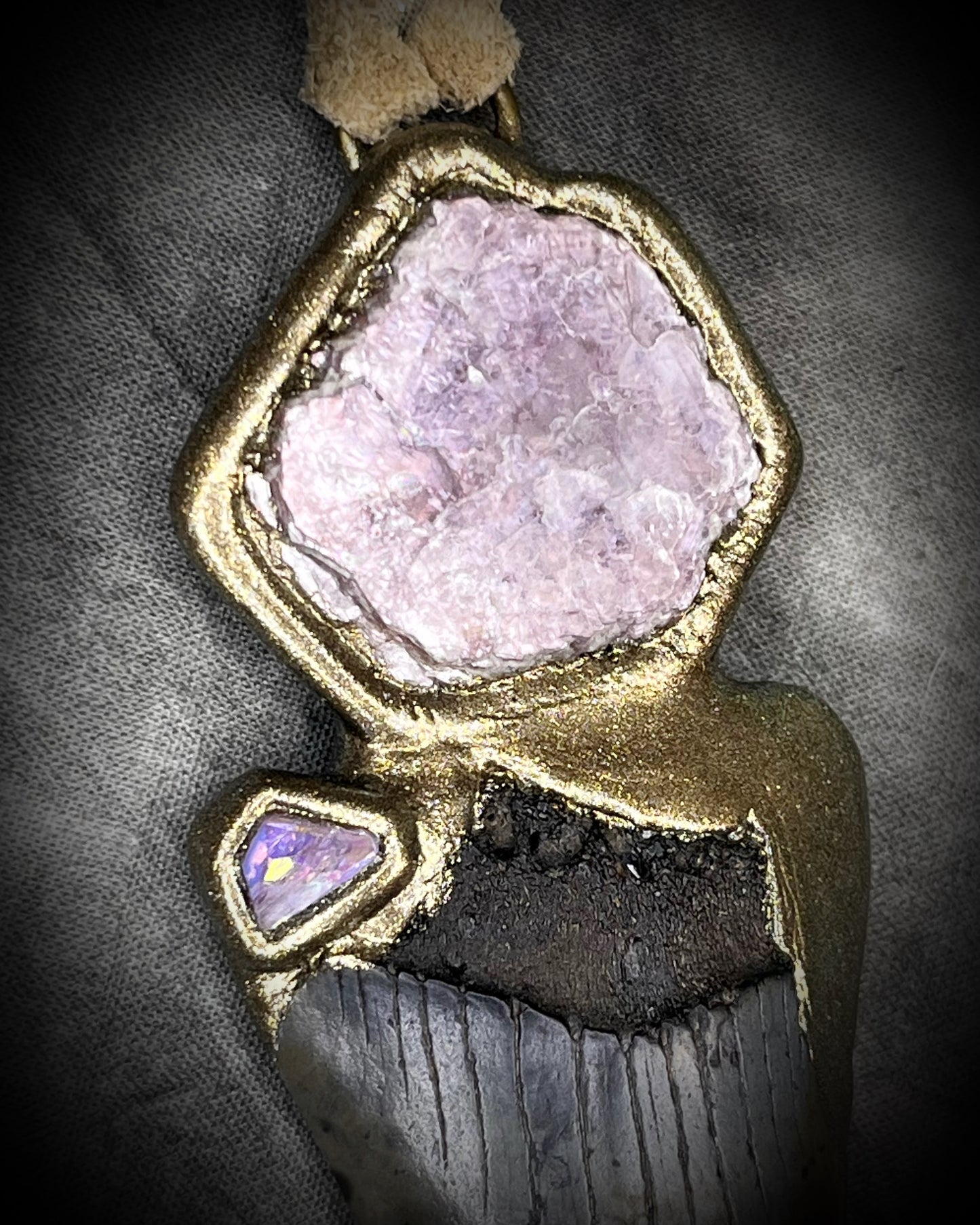 Fossil Mako Shark Tooth necklace hung from soft gold leather and adorned with soothing Lepidolite crystal and lavender spinel gemstone. Spiritual boho jewelry gift for her. 