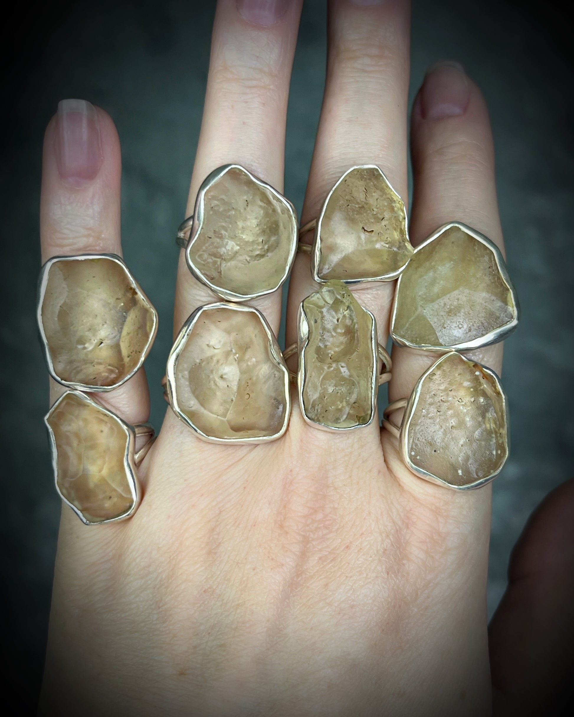 Genuine Libyan Desert Glass sterling silver ring featuring ancient impact glass with luminous golden tones. One of a kind by Become Spellbound, Baltimore Magazine Best of Baltimore 2026 Jewelry winner.