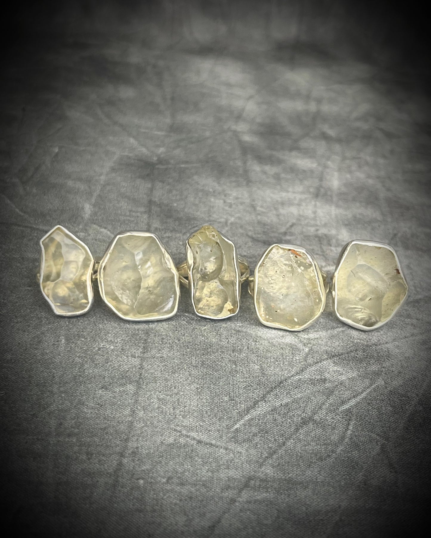 Genuine Libyan Desert Glass sterling silver ring featuring ancient impact glass with luminous golden tones. One of a kind by Become Spellbound, Baltimore Magazine Best of Baltimore 2026 Jewelry winner.
