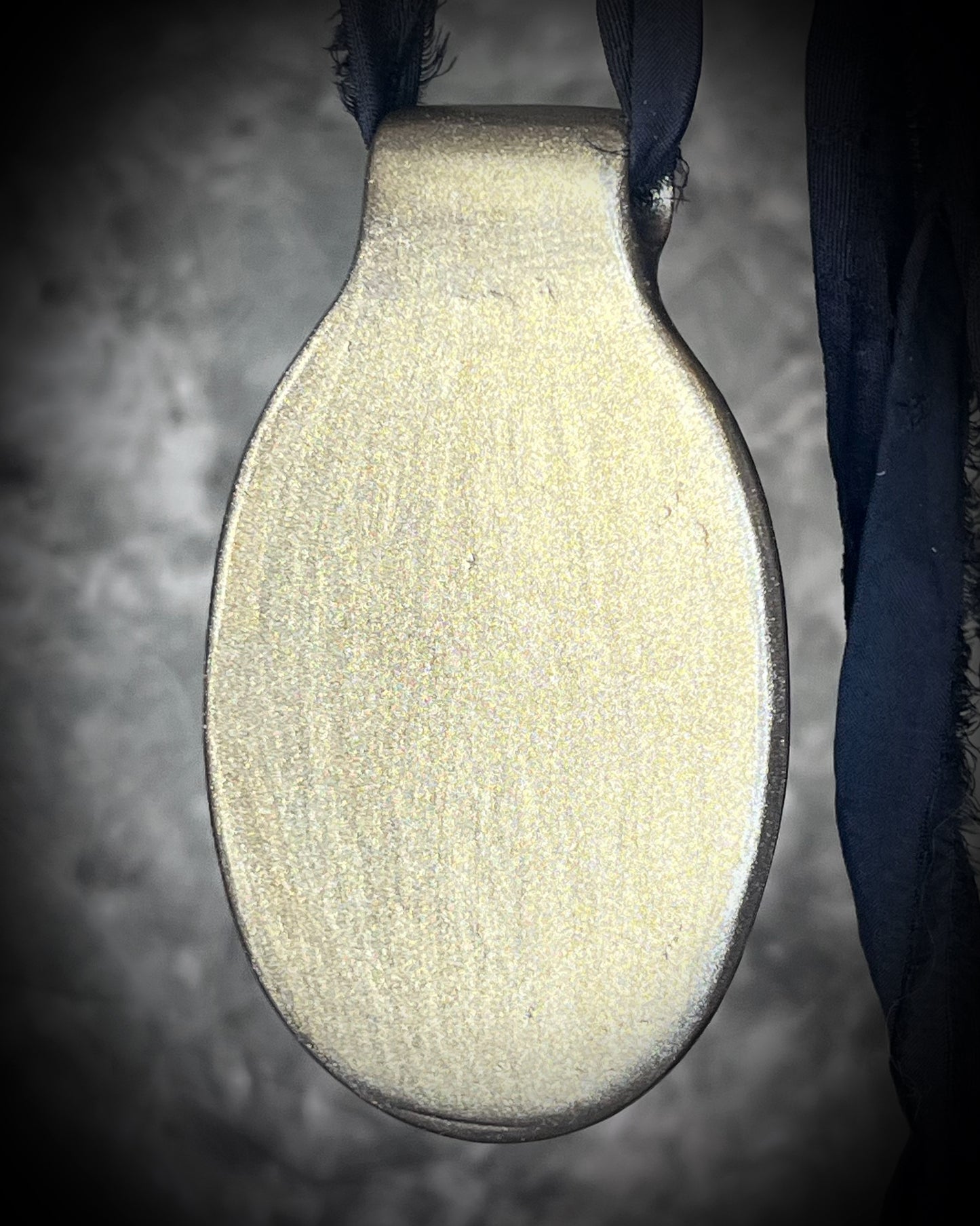 Glowing XXL Statement Necklace featuring a large Indonesian Amber gemstone with a gold setting, hung from black recycled silk. Maximalist holiday gift for her!