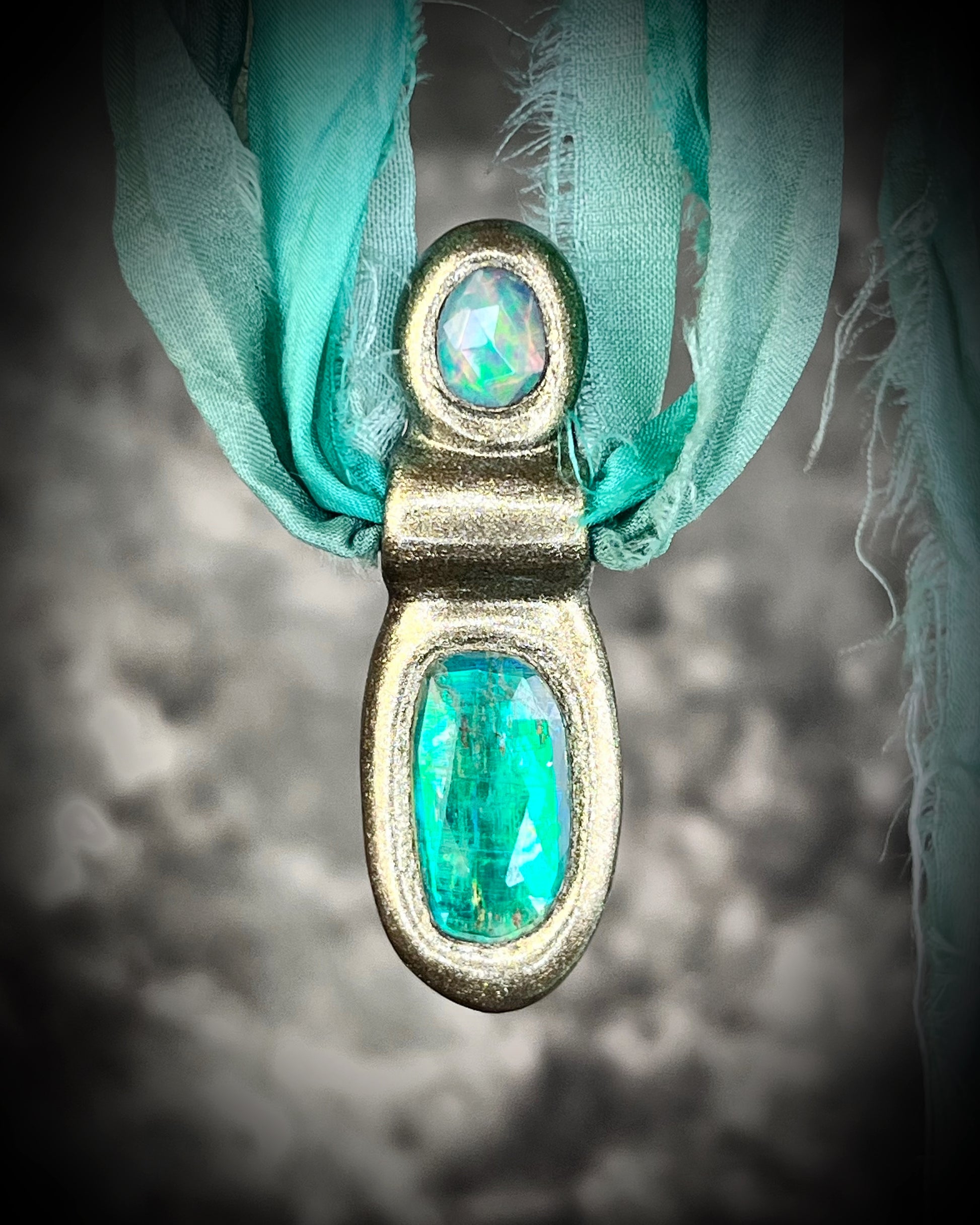 Green kyanite and opal gemstone faceted crystal healing heart chakra pendant on recycled silk.  Best travel jewelry for summer, festival or wedding