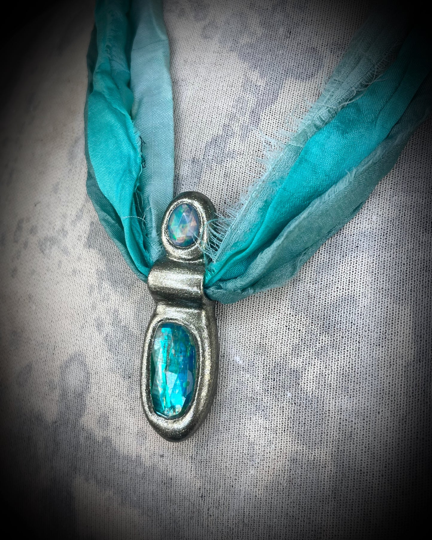 Green kyanite and opal gemstone faceted crystal healing heart chakra pendant on recycled silk.  Best travel jewelry for summer, festival or wedding