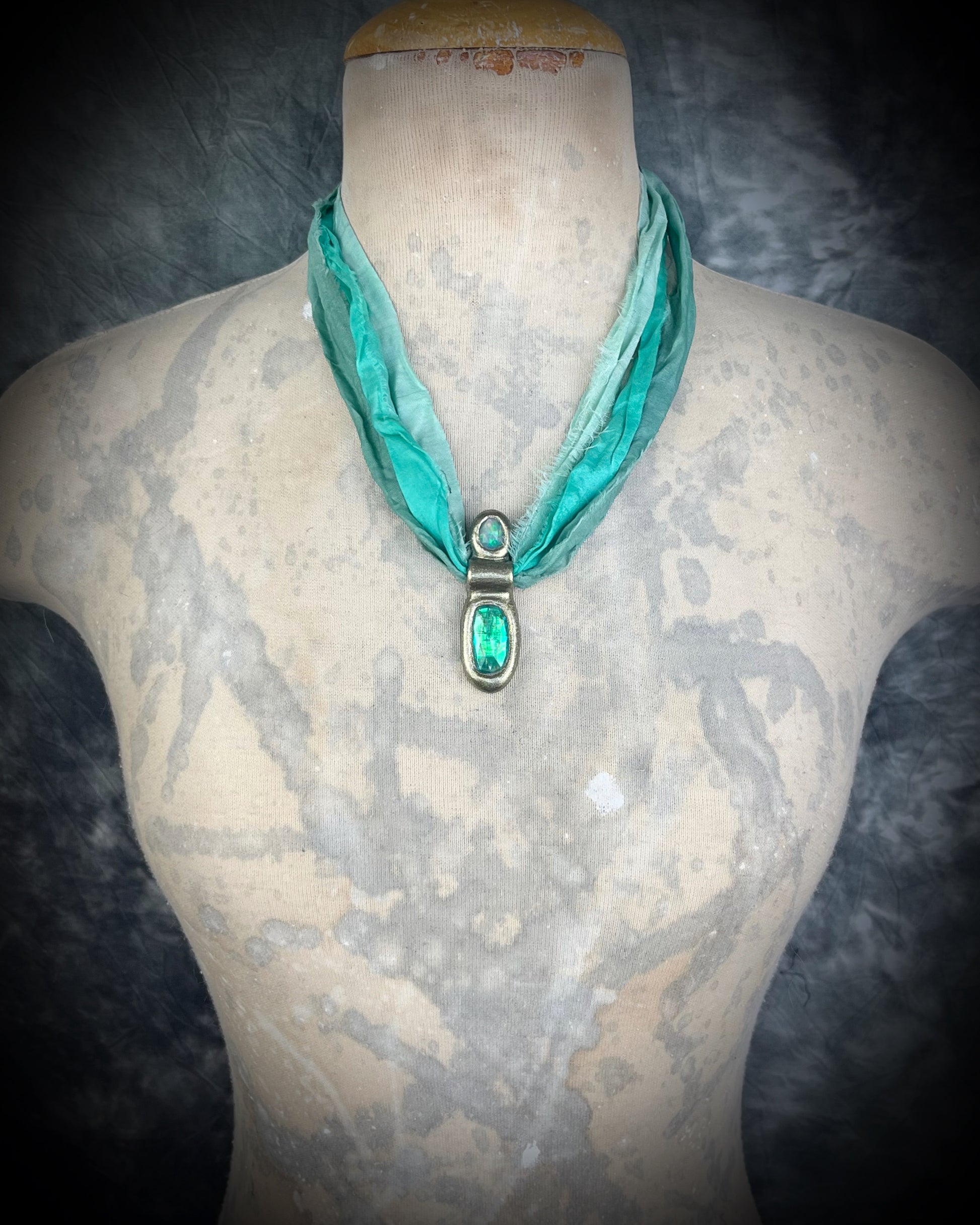 Green kyanite and opal gemstone faceted crystal healing heart chakra pendant on recycled silk.  Best travel jewelry for summer, festival or wedding