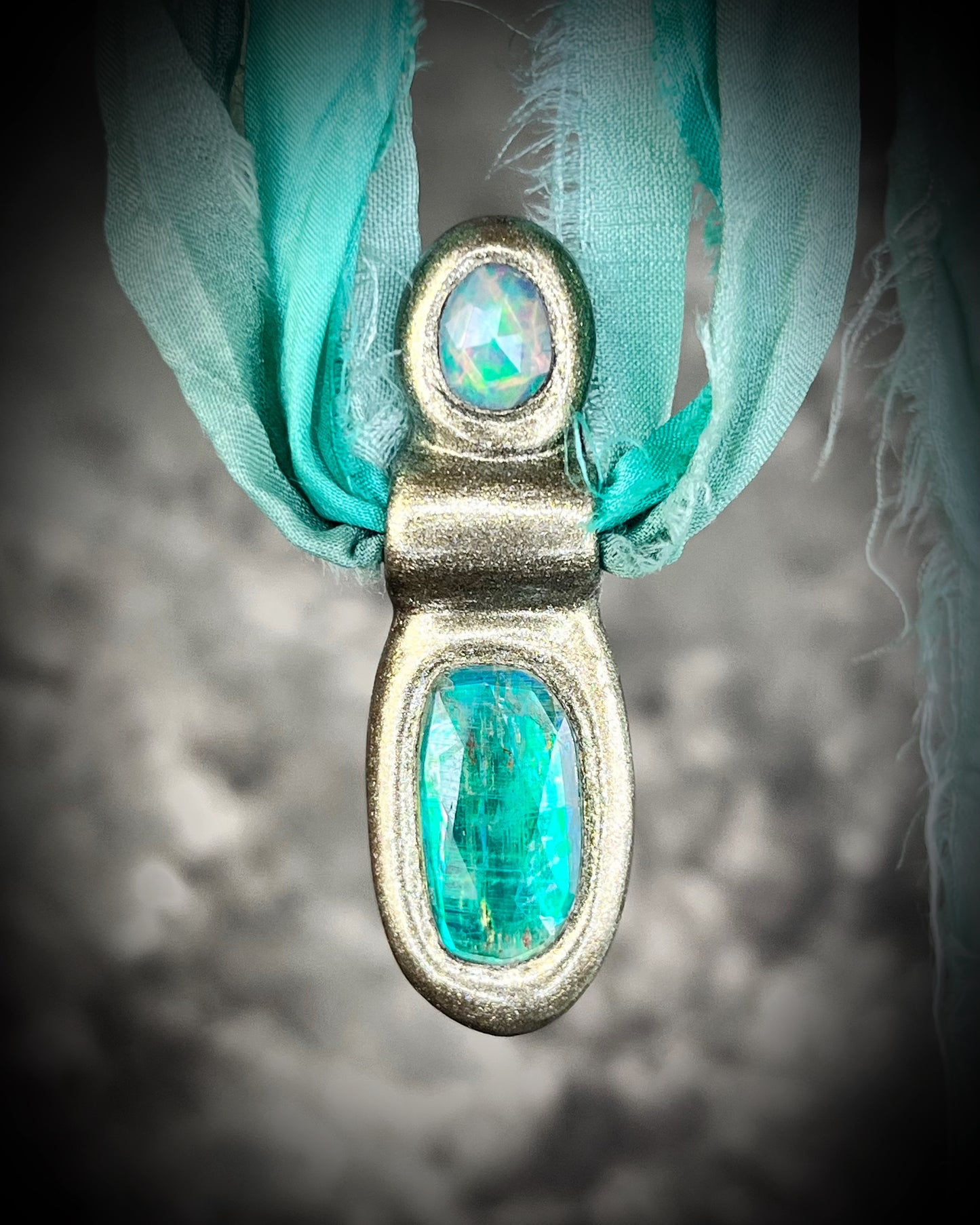 Green kyanite and opal gemstone faceted crystal healing heart chakra pendant on recycled silk.  Best travel jewelry for summer, festival or wedding