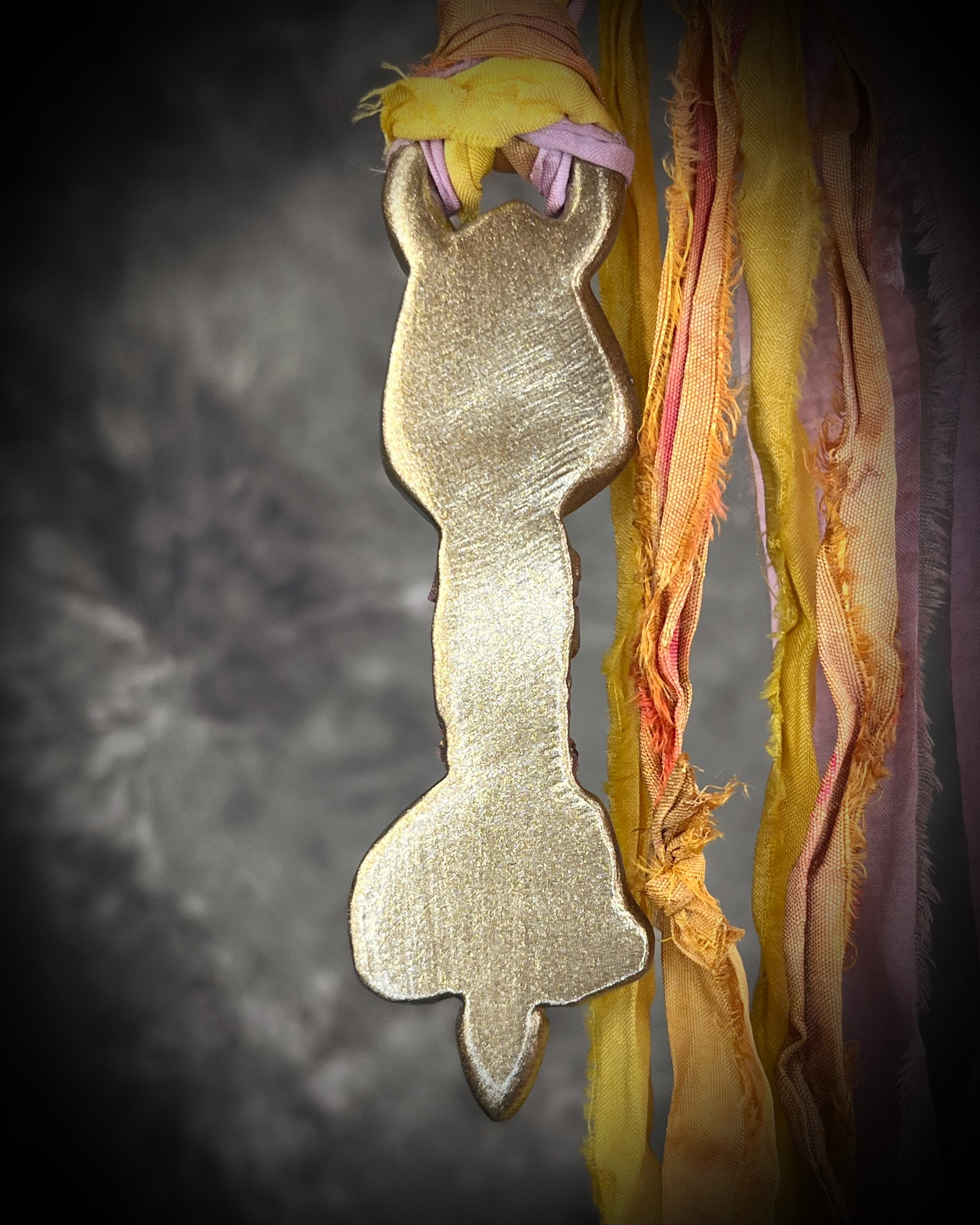 Handcrafted Libyan Desert Glass, Ruby, Lepidolite and Green Tourmaline Museum grade talisman pendant hung from recycled silks in a gold sculptural finish. 