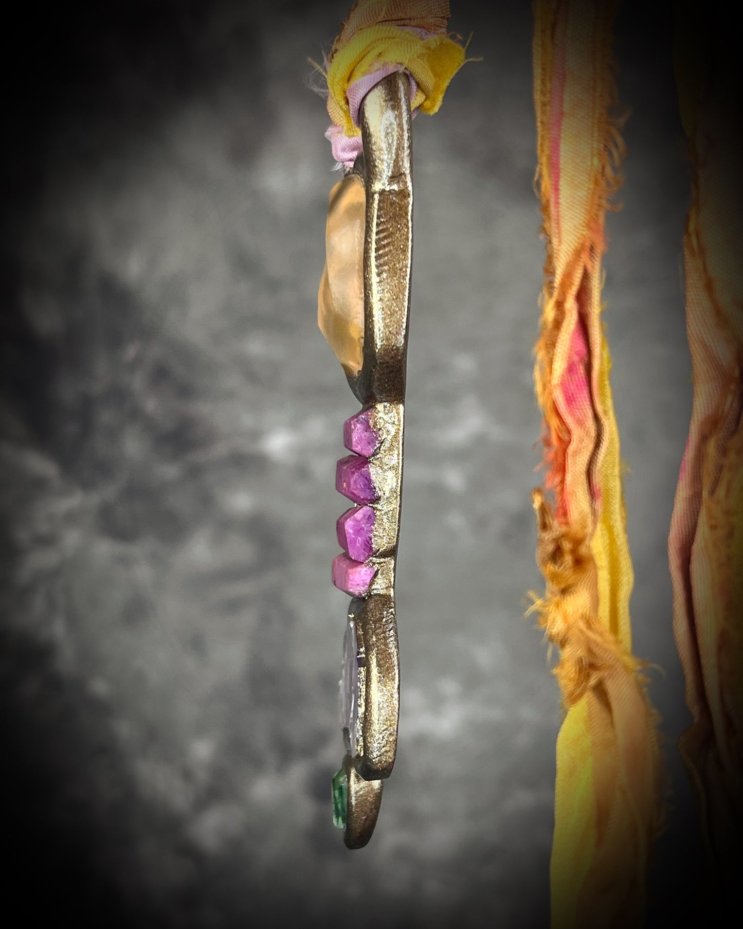 Handcrafted Libyan Desert Glass, Ruby, Lepidolite and Green Tourmaline Museum grade talisman pendant hung from recycled silks in a gold sculptural finish. 