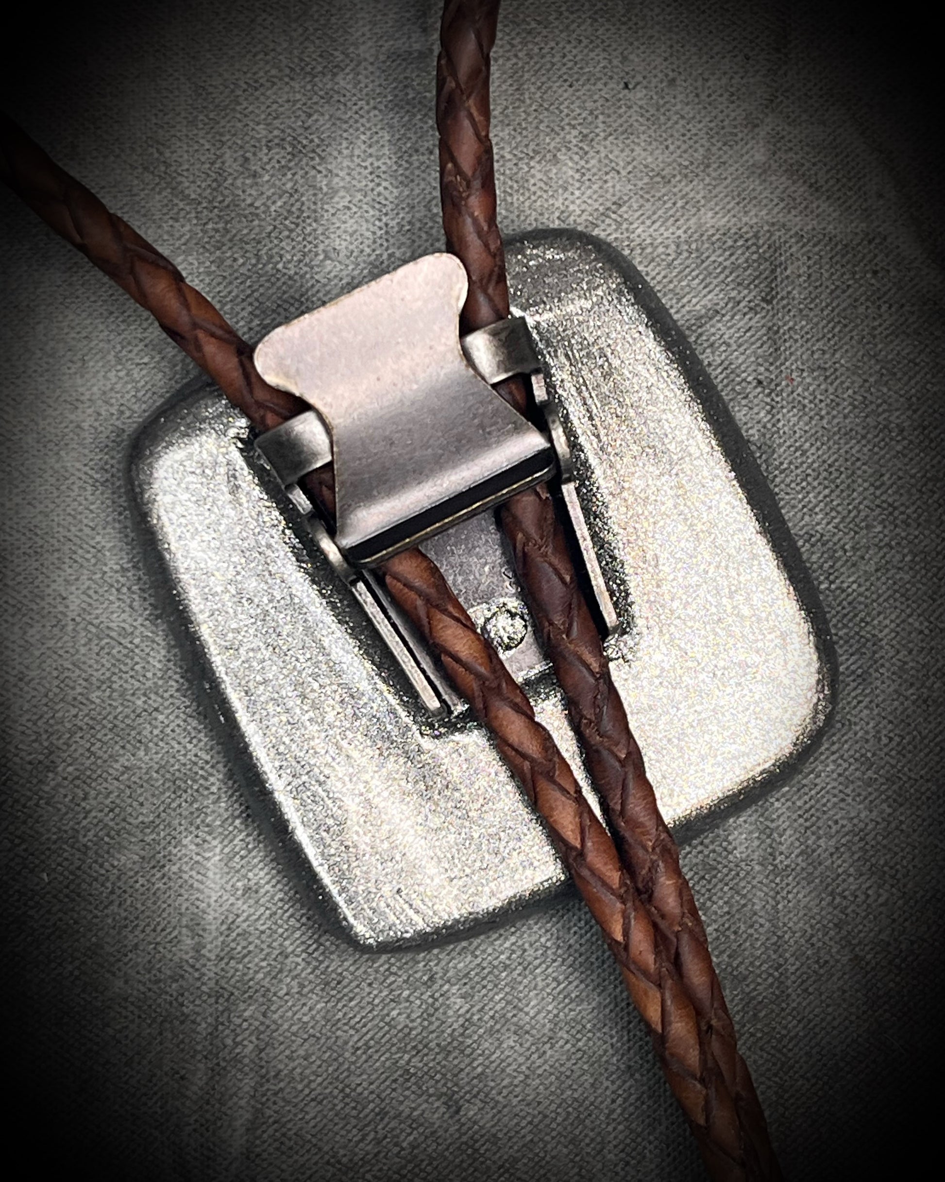 Handmade Chrysocolla Bolo Tie in Silver Finish with Silver Tips on Brown Braided Leather. Artisan modern bolo tie gift for him. 