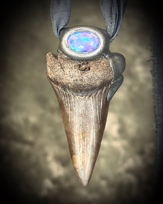 Handmade Ethereal and Powerful Mako shark tooth and opal fossil pendant on grey recycled silk. 