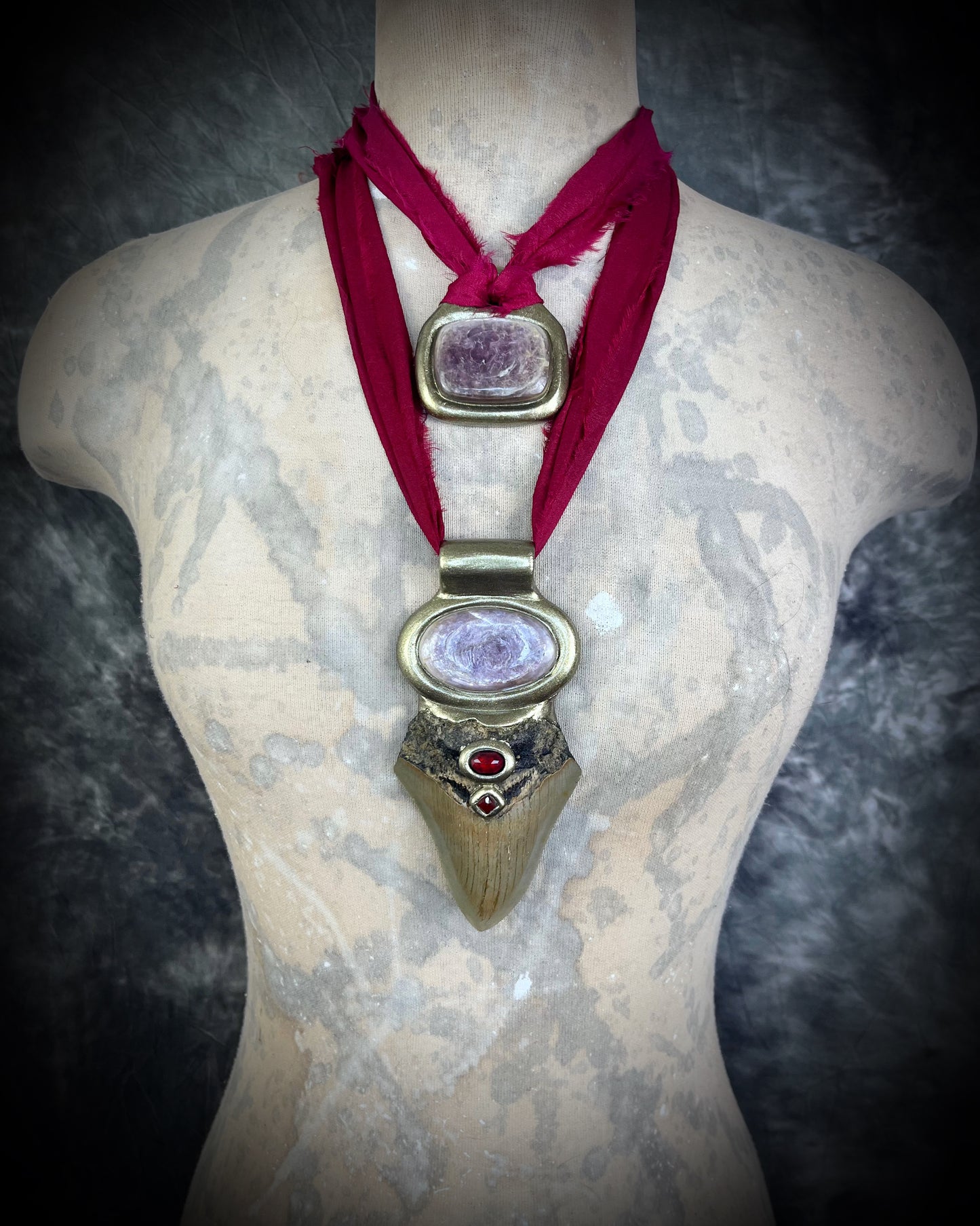 Handmade Megalodon fossil necklace with lepidolite crystal and garnet gemstone on recycled silk — mystical statement jewelry for strength and grounding.