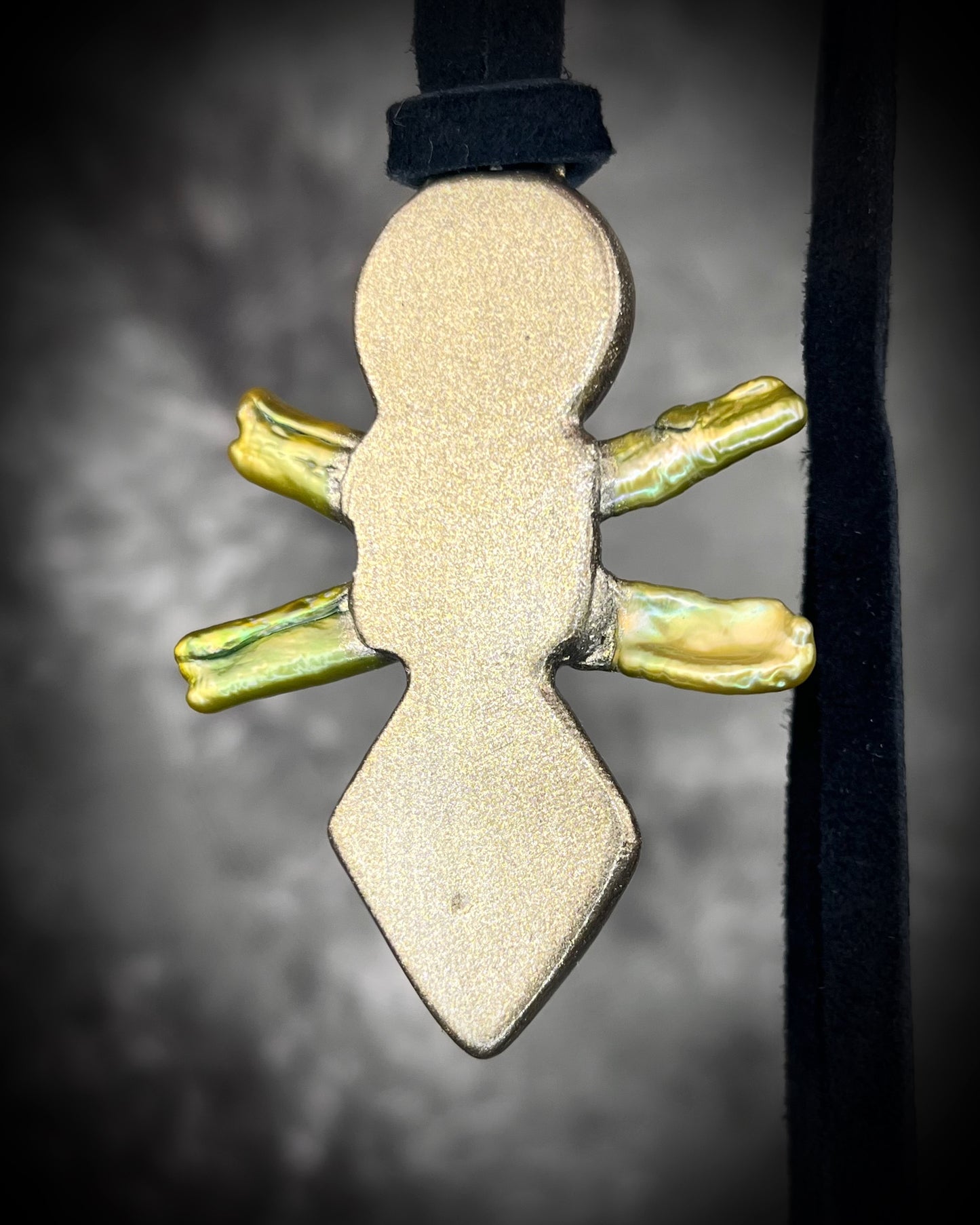 Handmade Moldavite Power Talisman Necklace with Pyrite, Garnet and Green Pearls. Transformation pendant hung from soft black leather. Unisex spiritual elevation talisman. Back view.