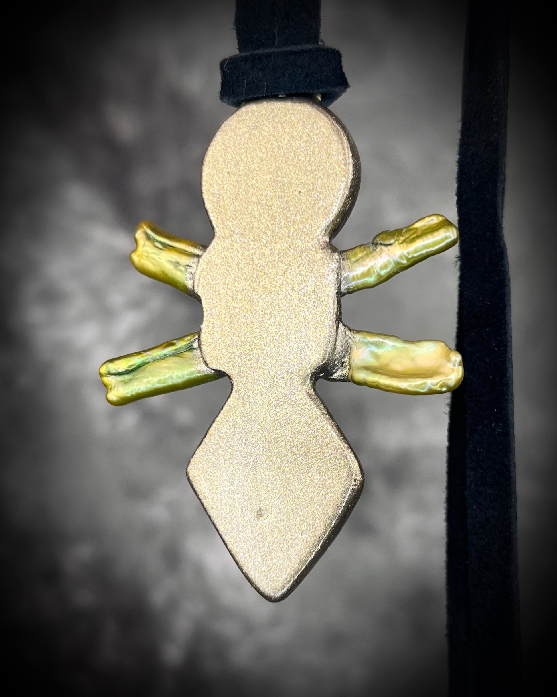 Handmade Moldavite Power Talisman Necklace with Pyrite, Garnet and Green Pearls. Transformation pendant hung from soft black leather. Unisex spiritual elevation talisman. Back view.