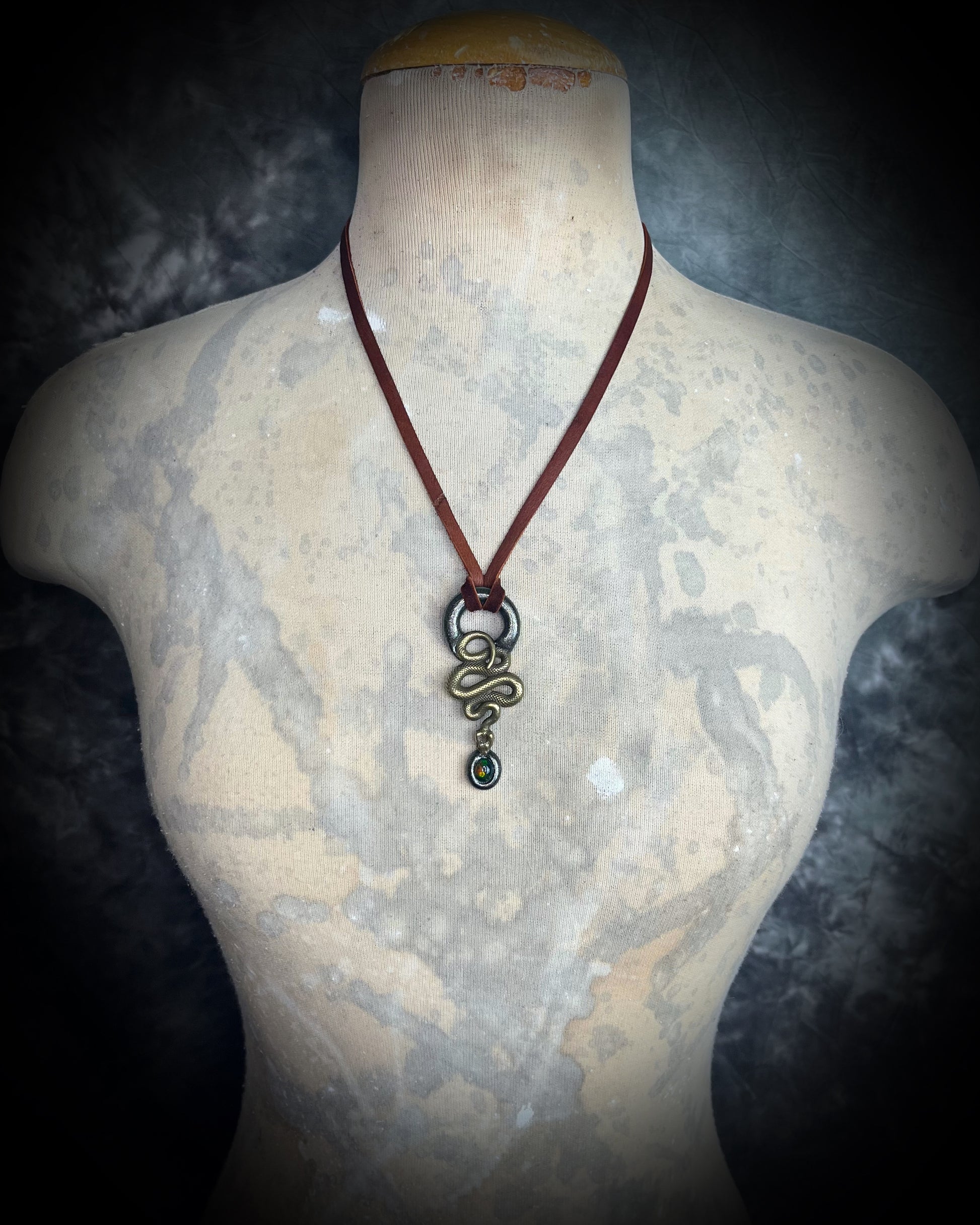 Handmade black opal pendant with brass serpent design, gothic crystal necklace for shadow work, intuition, and metaphysical protection.