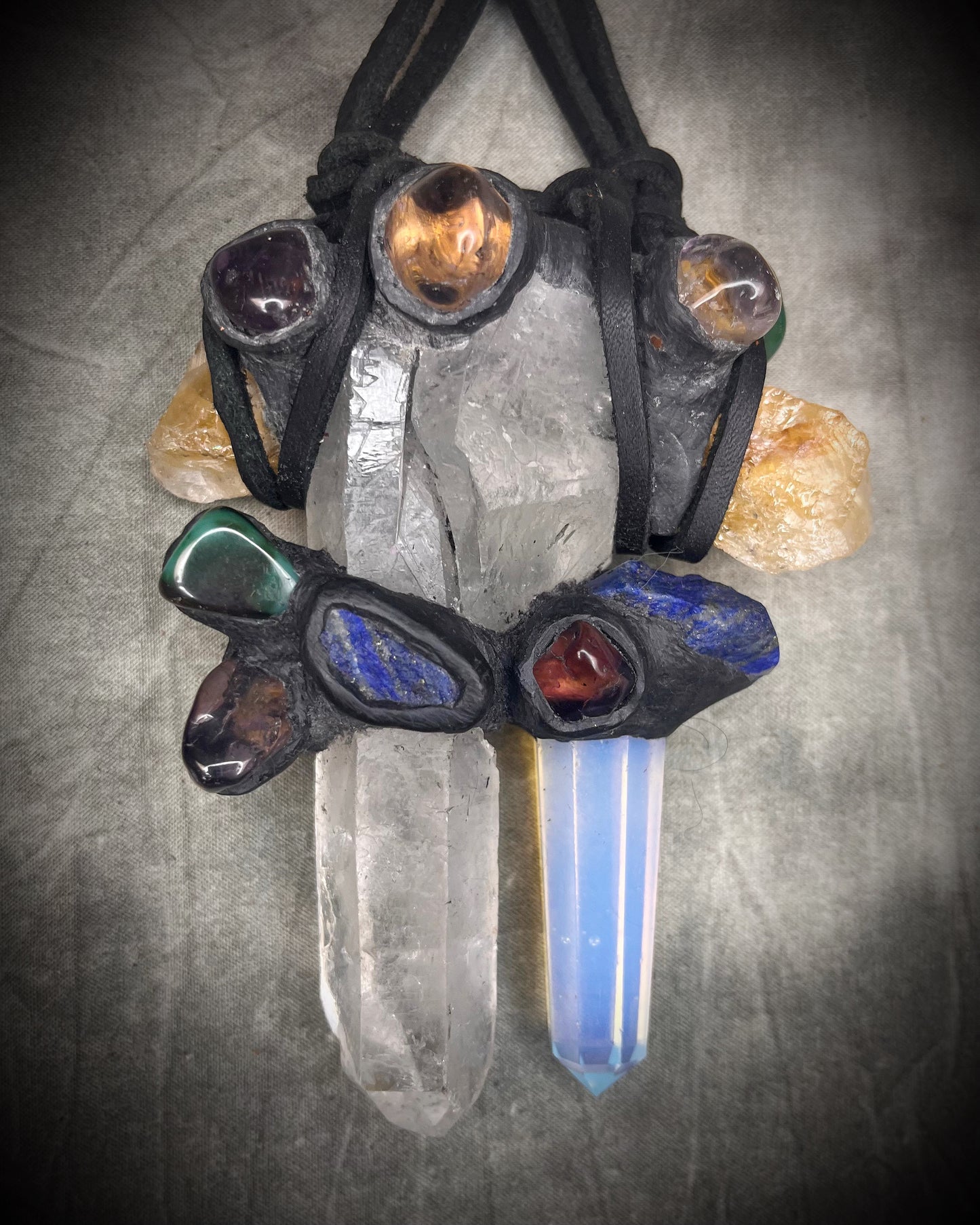 Handmade extra large crystal statement necklace with quartz crystals, opalite, lapis lazuli, citrine, jasper, and mixed gemstones on black leather with handmade wire clasp.