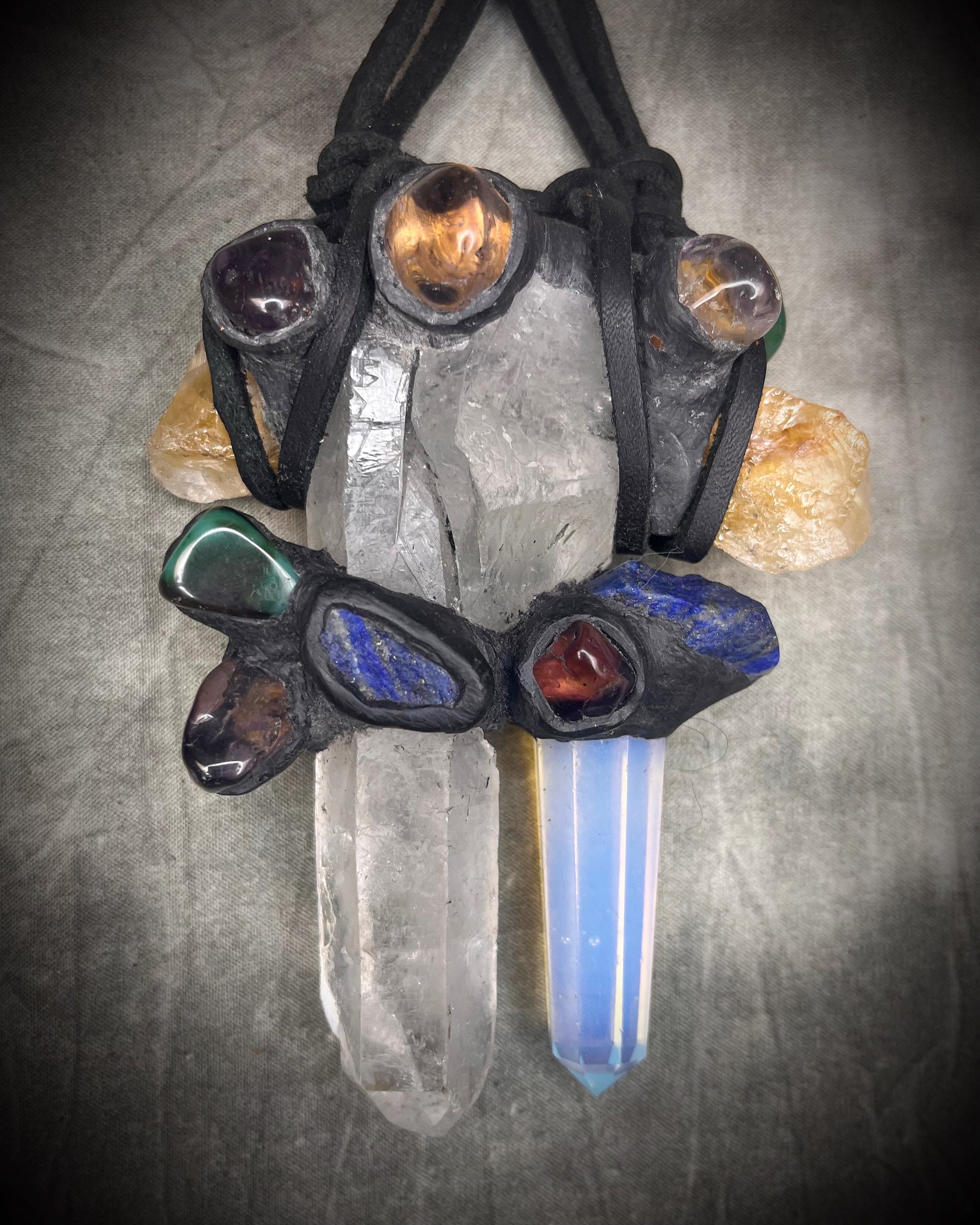 Handmade extra large crystal statement necklace with quartz crystals, opalite, lapis lazuli, citrine, jasper, and mixed gemstones on black leather with handmade wire clasp.