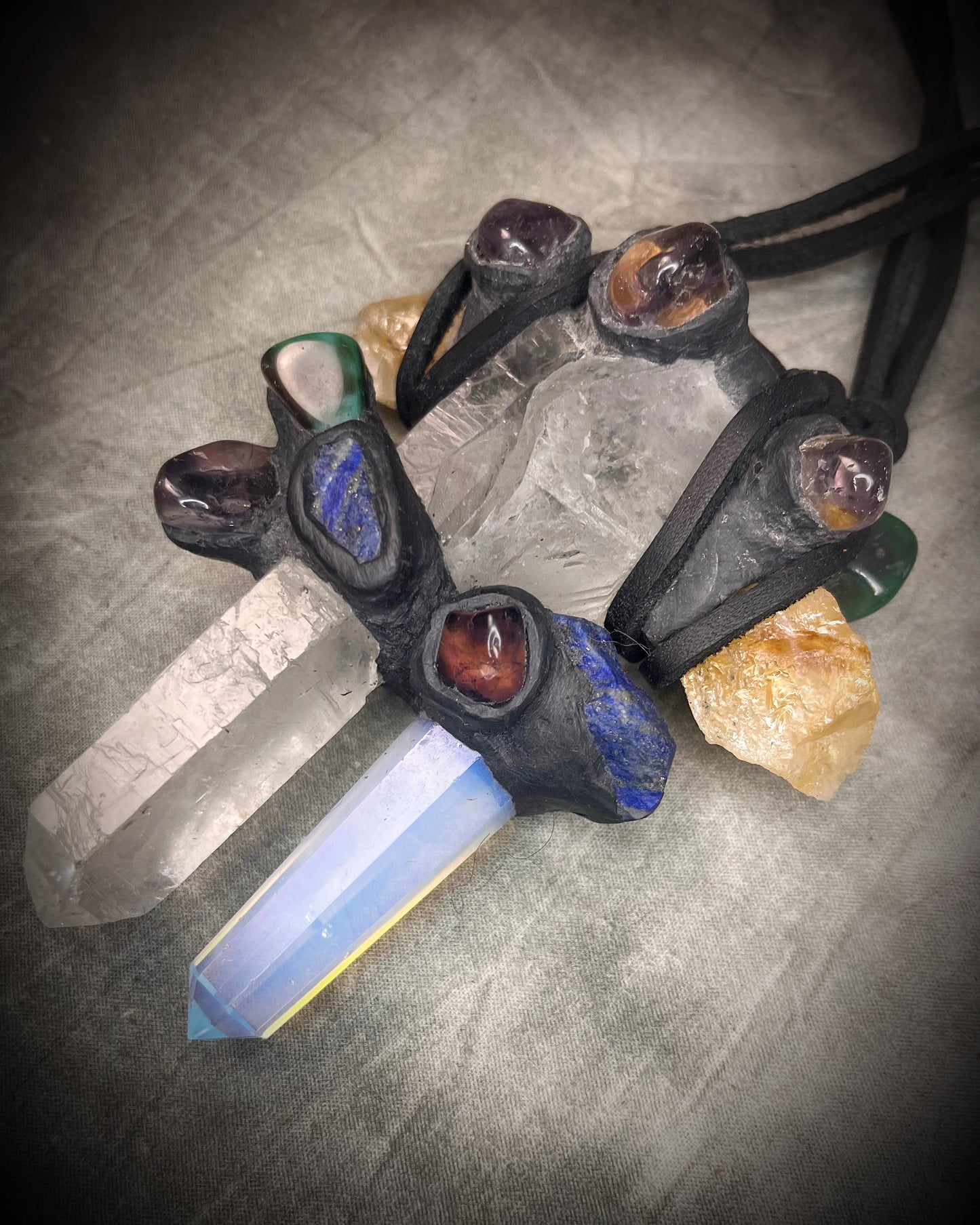 Handmade extra large crystal statement necklace with quartz crystals, opalite, lapis lazuli, citrine, jasper, and mixed gemstones on black leather with handmade wire clasp.