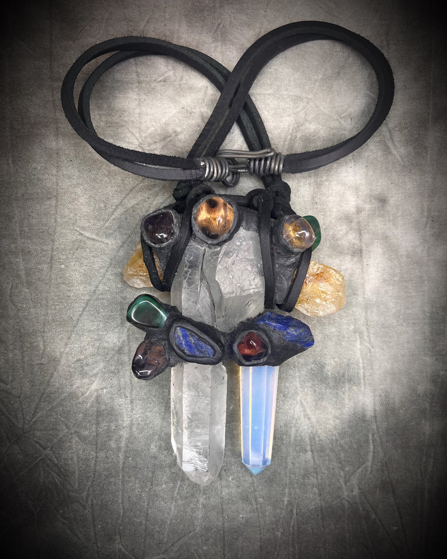Handmade extra large crystal statement necklace with quartz crystals, opalite, lapis lazuli, citrine, jasper, and mixed gemstones on black leather with handmade wire clasp.
