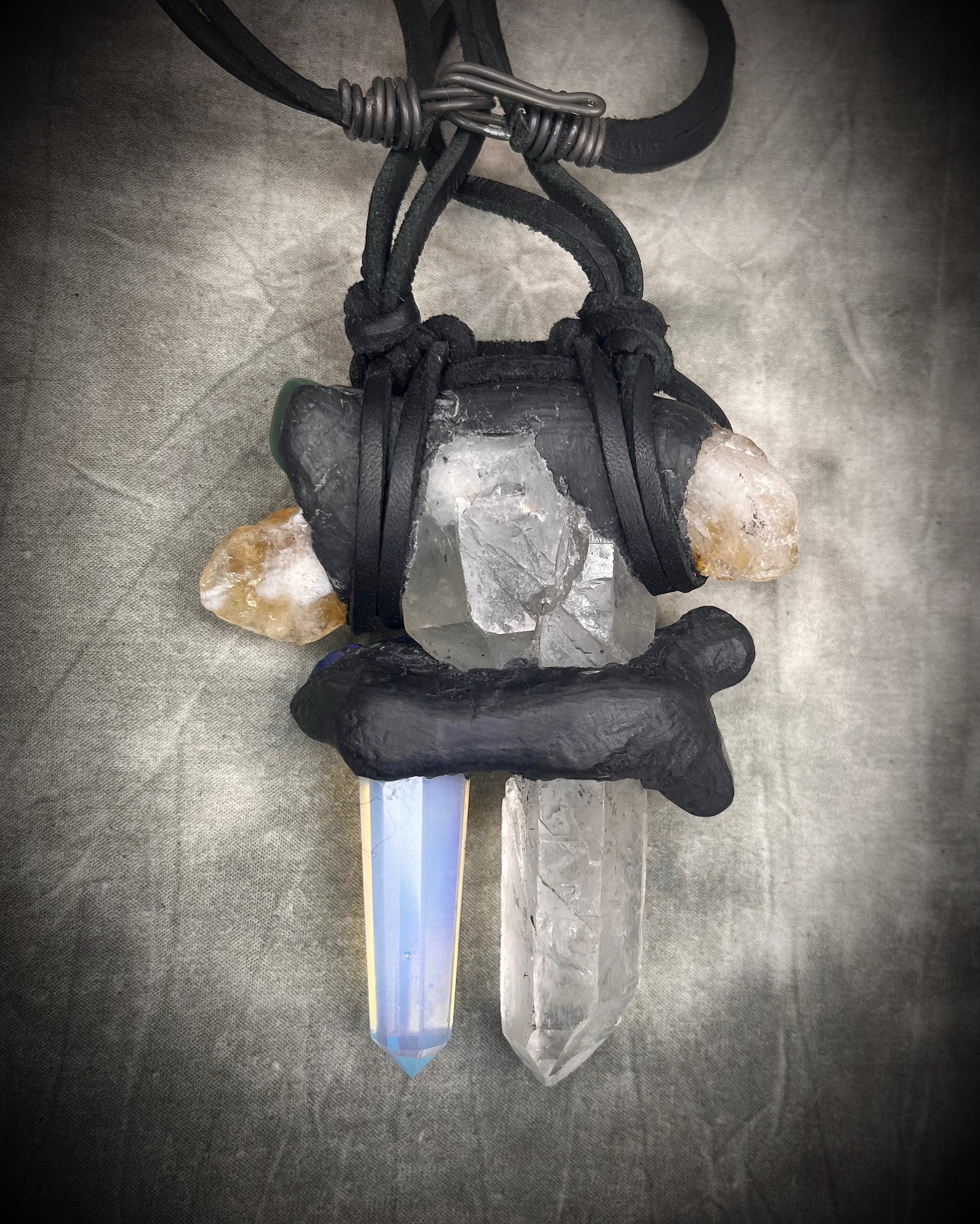 Handmade extra large crystal statement necklace with quartz crystals, opalite, lapis lazuli, citrine, jasper, and mixed gemstones on black leather with handmade wire clasp.